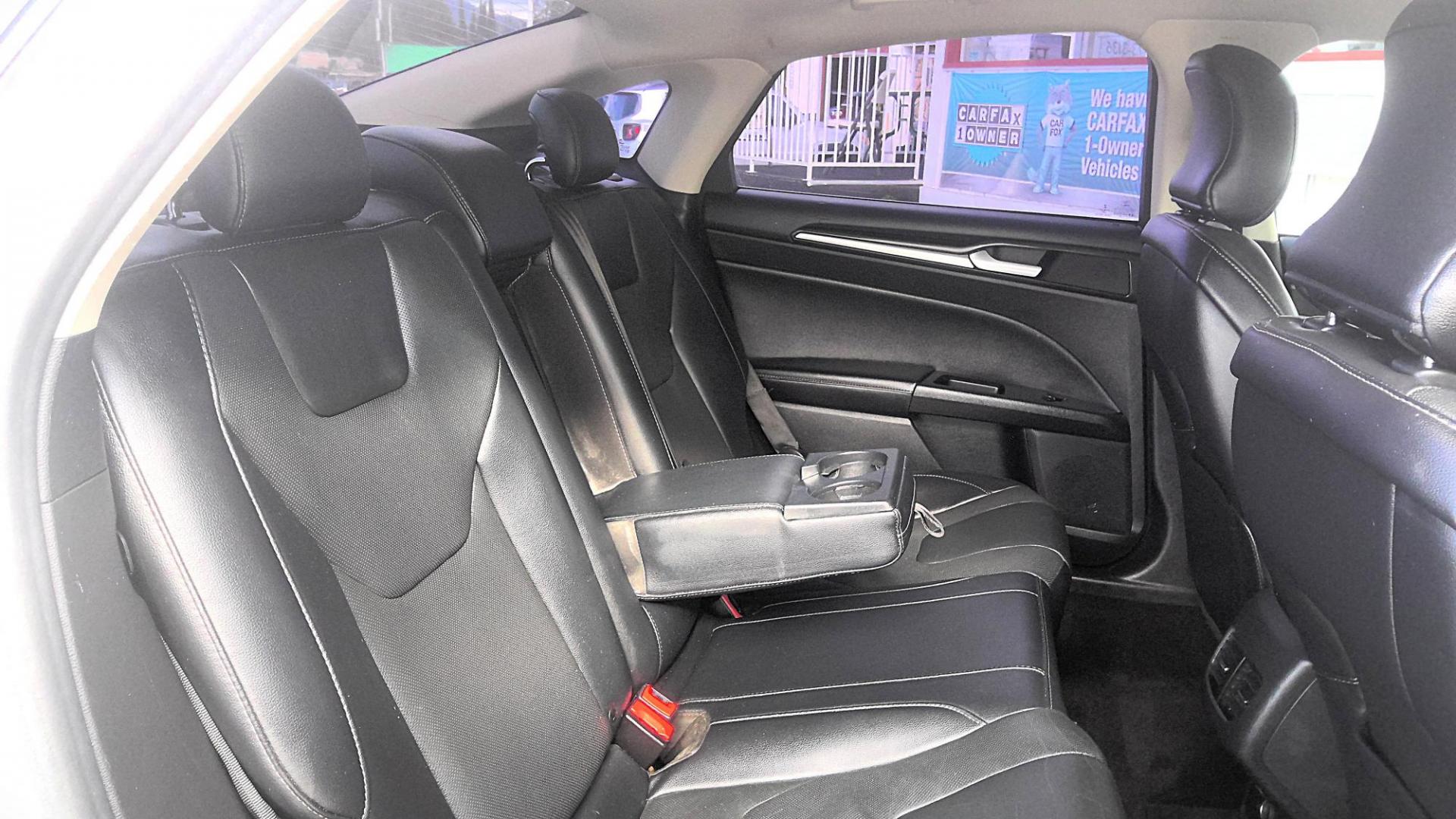 2019 SILVER Ford Fusion Titanium AWD (3FA6P0D94KR) with an 2.0L L4 DOHC 16V engine, 6A transmission, located at 502 S. Riverside Avenue, Medford, OR, 97501, (541) 773-3136, 42.322803, -122.867477 - Photo#5