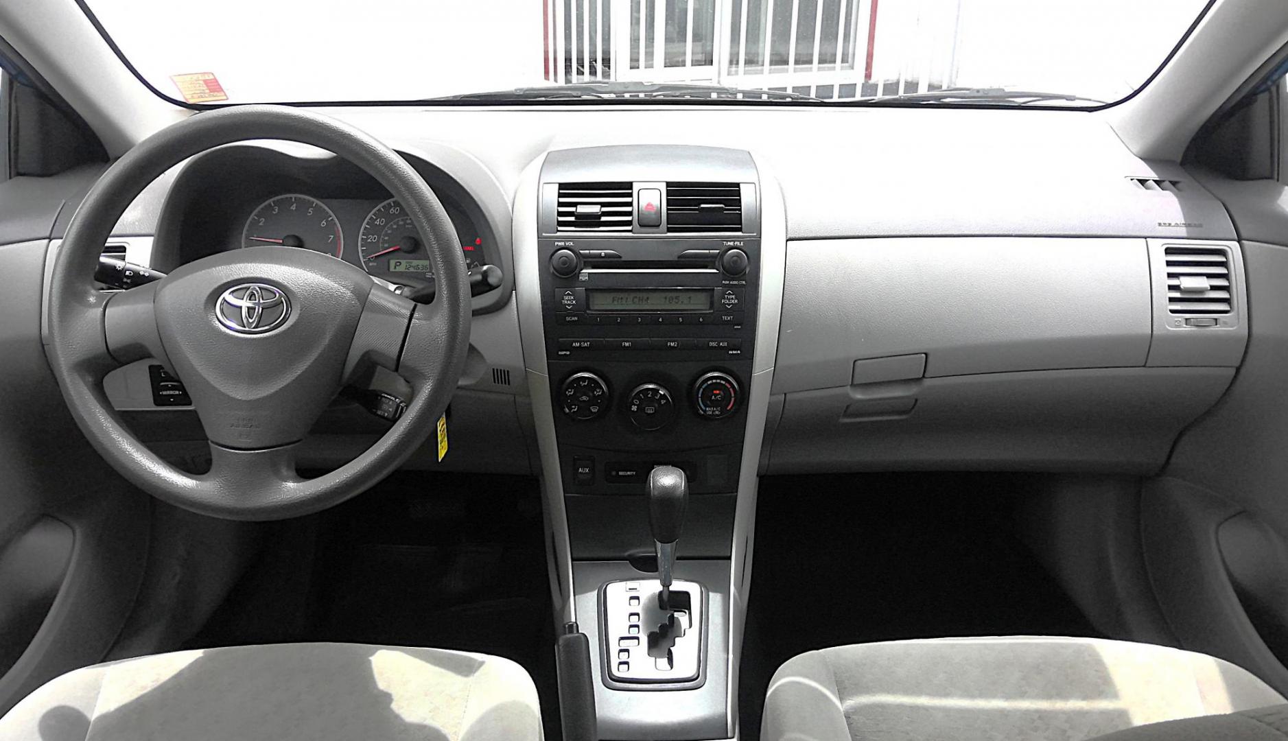 2009 BLUE Toyota Corolla Base 4-Speed AT (1NXBU40E29Z) with an 1.8L L4 DOHC 16V engine, 4-Speed Automatic Overdrive transmission, located at 502 S. Riverside Avenue, Medford, OR, 97501, (541) 773-3136, 42.322803, -122.867477 - Photo#7