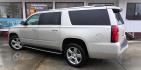 2017 GOLD Chevrolet Suburban Premier 4WD (1GNSKJKCXHR) with an 5.3L V8 OHV 16V engine, 6A transmission, located at 502 S. Riverside Avenue, Medford, OR, 97501, (541) 773-3136, 42.322803, -122.867477 - Photo#2