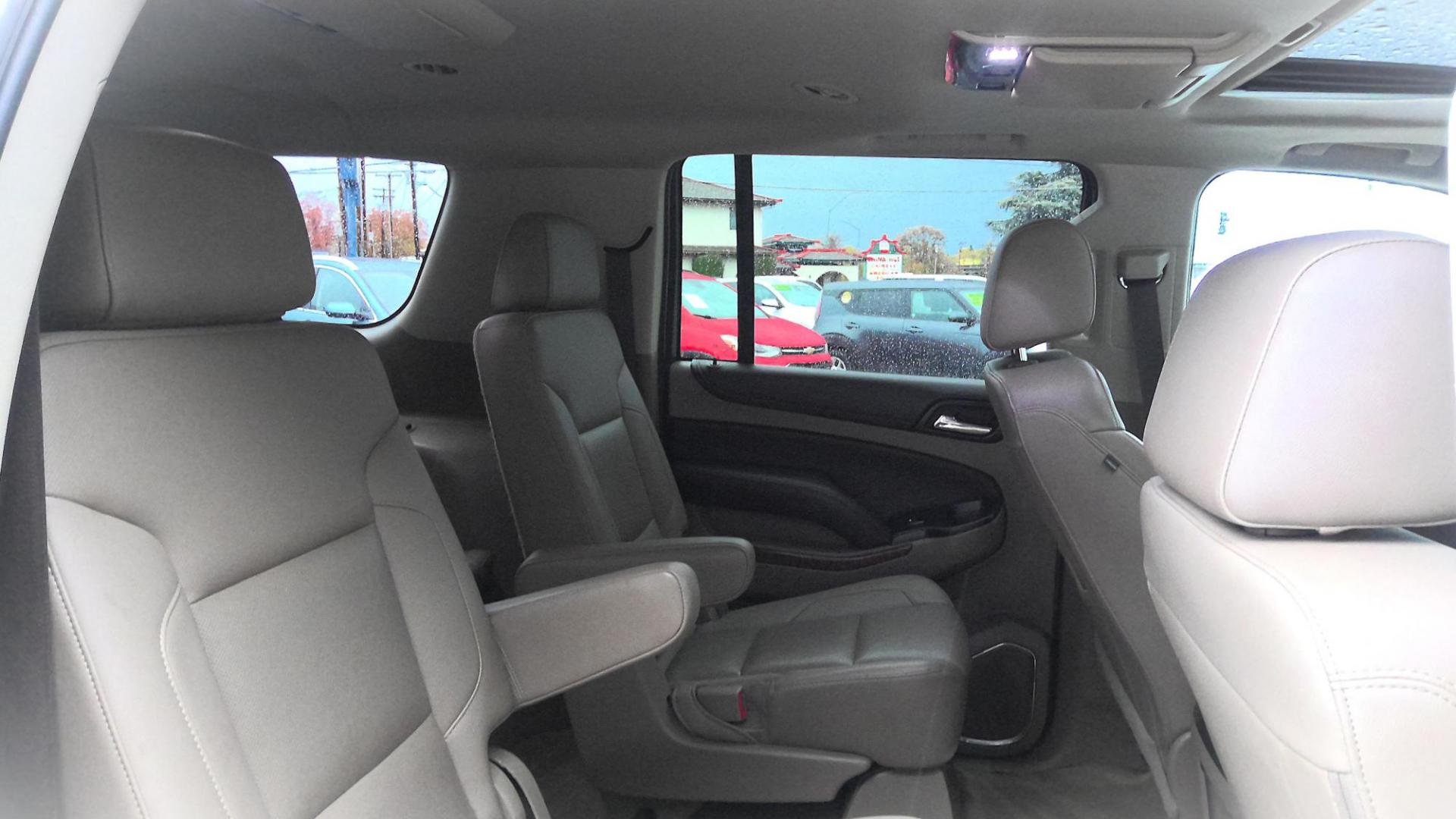 2017 GOLD Chevrolet Suburban Premier 4WD (1GNSKJKCXHR) with an 5.3L V8 OHV 16V engine, 6A transmission, located at 502 S. Riverside Avenue, Medford, OR, 97501, (541) 773-3136, 42.322803, -122.867477 - Photo#11