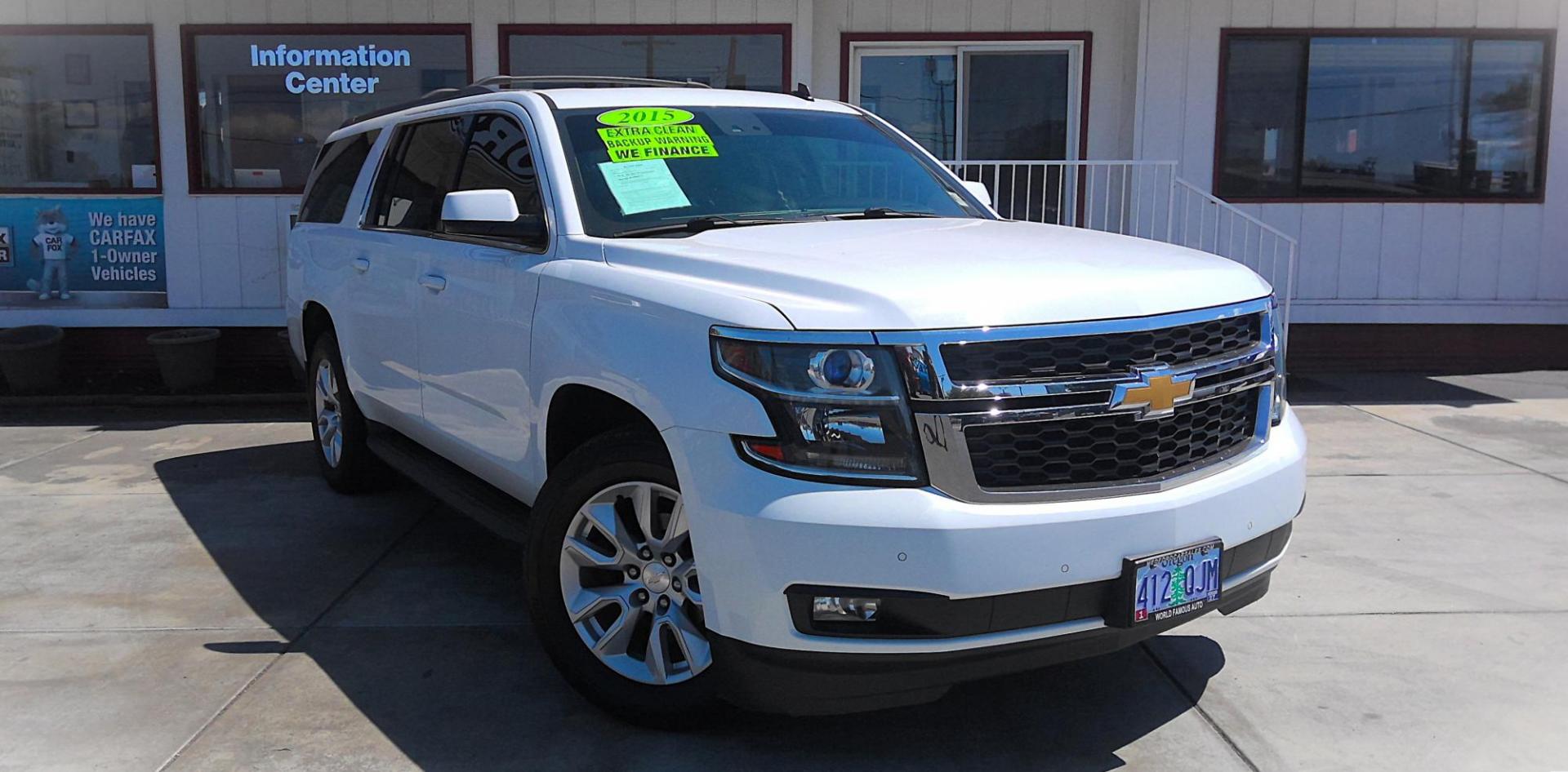 2015 WHITE Chevrolet Suburban LT 1500 4WD (1GNSKJKC6FR) with an 5.3L V8 OHV 16V engine, 6-Speed Automatic transmission, located at 502 S. Riverside Avenue, Medford, OR, 97501, (541) 773-3136, 42.322803, -122.867477 - Photo#1