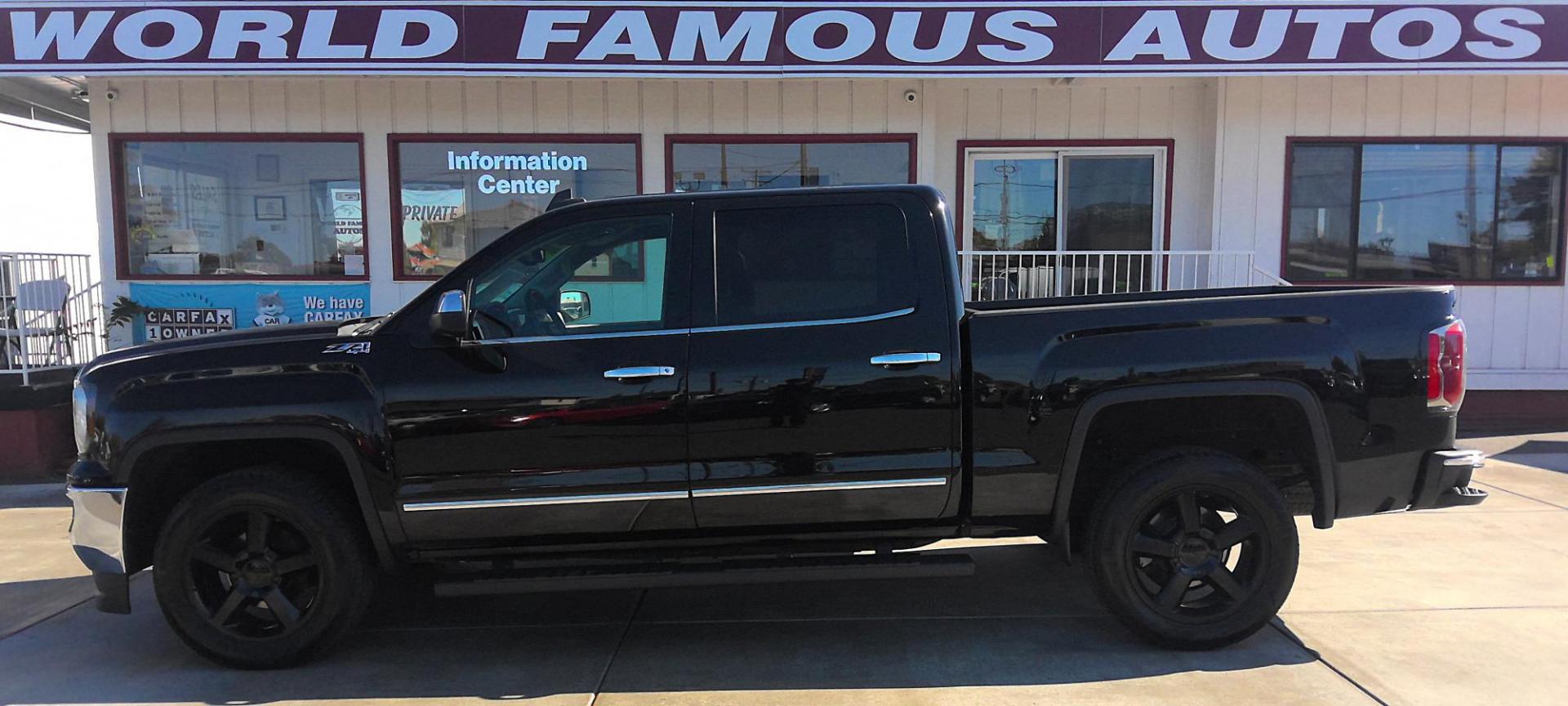 2018 BLACK GMC Sierra 1500 SLT Crew Cab Short Box 4WD (3GTU2NEC6JG) with an 5.3L V8 OHV 16V engine, 6A transmission, located at 502 S. Riverside Avenue, Medford, OR, 97501, (541) 773-3136, 42.322803, -122.867477 - Photo#0