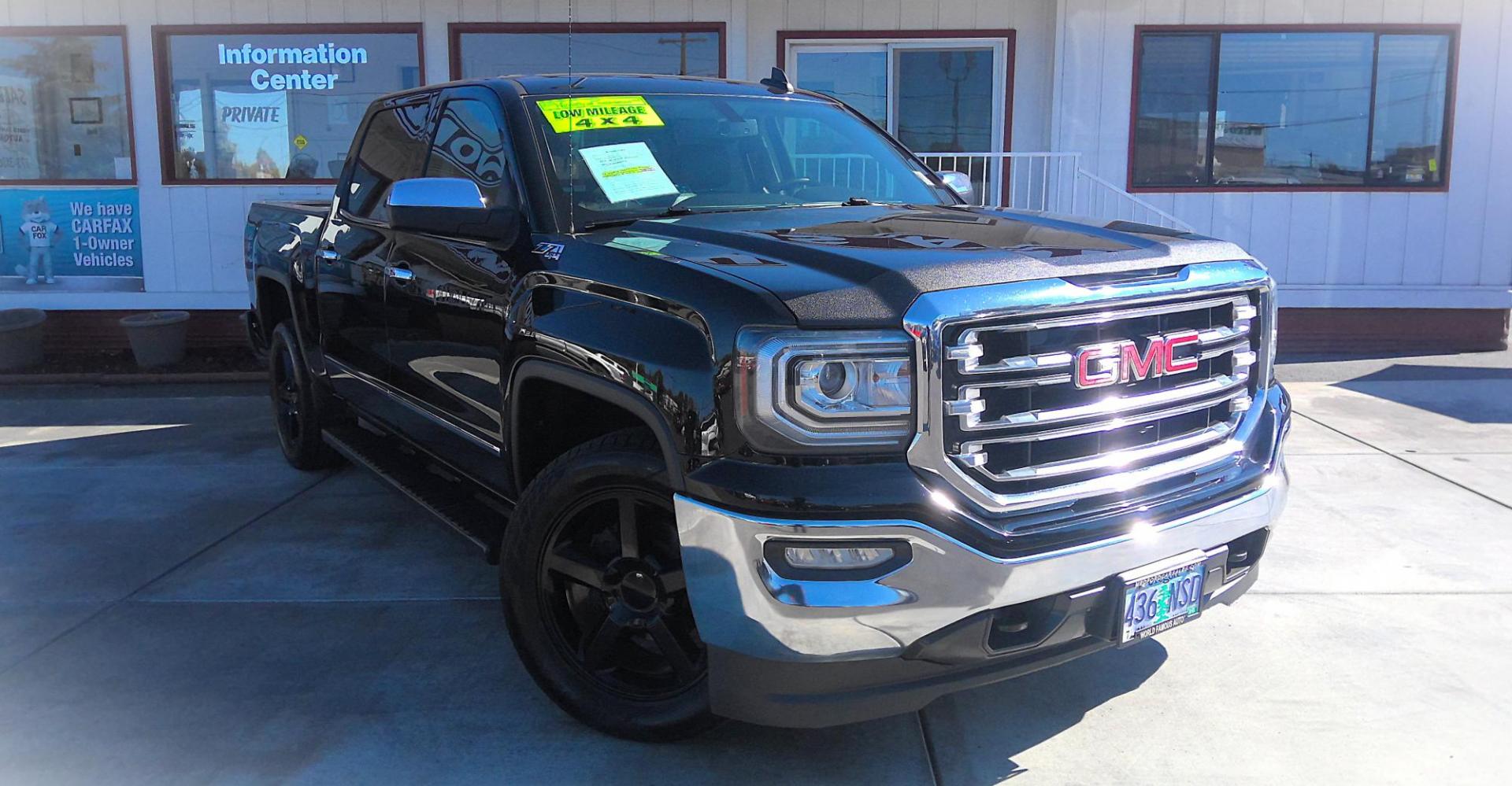 2018 BLACK GMC Sierra 1500 SLT Crew Cab Short Box 4WD (3GTU2NEC6JG) with an 5.3L V8 OHV 16V engine, 6A transmission, located at 502 S. Riverside Avenue, Medford, OR, 97501, (541) 773-3136, 42.322803, -122.867477 - Photo#1