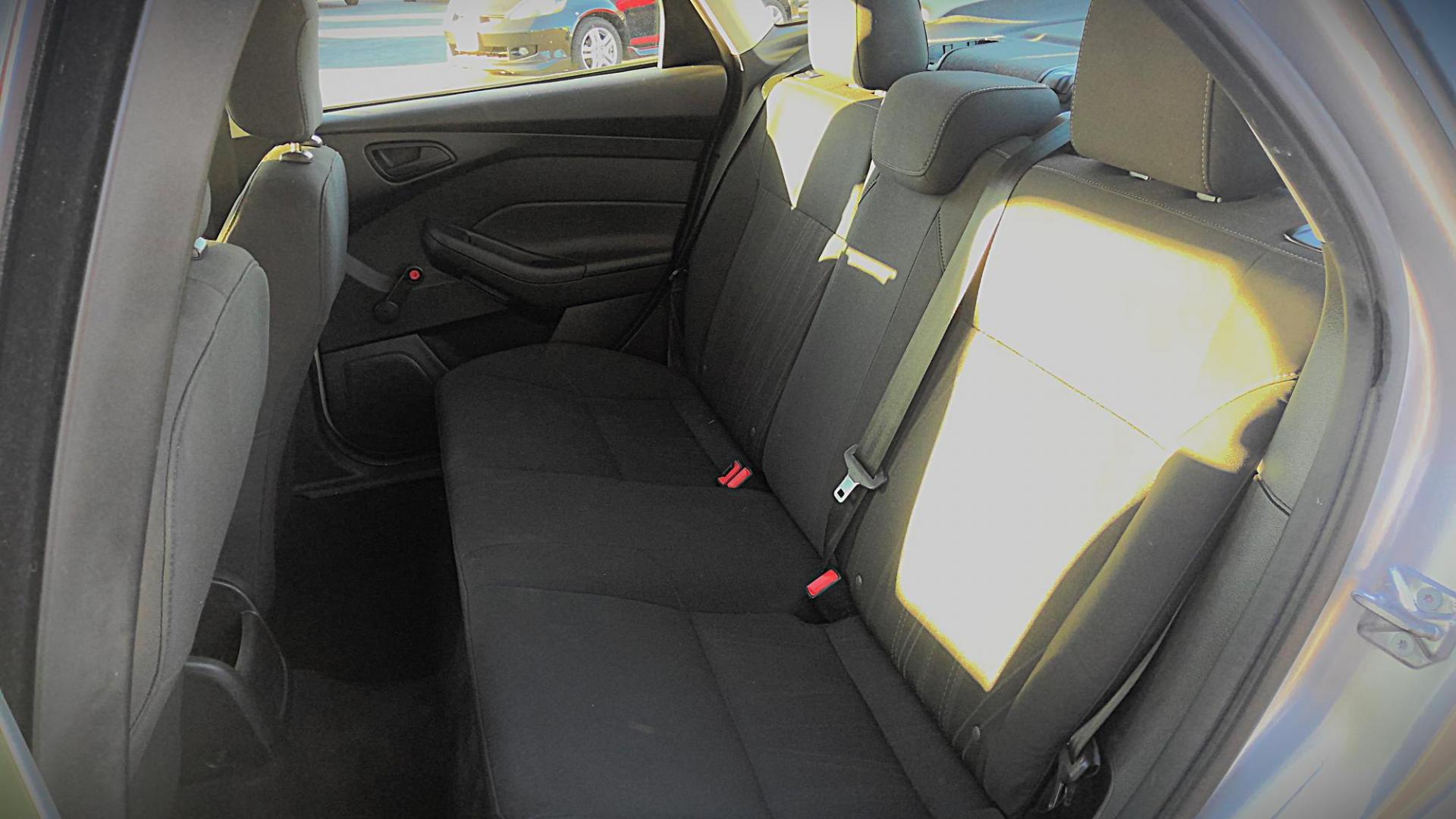 2015 SILVER Ford Focus S Sedan (1FADP3E26FL) with an 2.0L L4 DOHC 16V engine, 5-Speed Manual transmission, located at 502 S. Riverside Avenue, Medford, OR, 97501, (541) 773-3136, 42.322803, -122.867477 - Photo#5