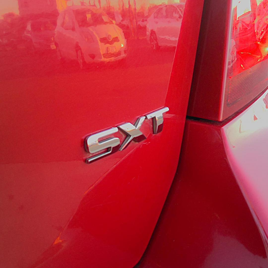 2013 RED Dodge Avenger SXT (1C3CDZCB9DN) with an 2.4L L4 DOHC 16V engine, 6-Speed Automatic transmission, located at 502 S. Riverside Avenue, Medford, OR, 97501, (541) 773-3136, 42.322803, -122.867477 - Photo#3