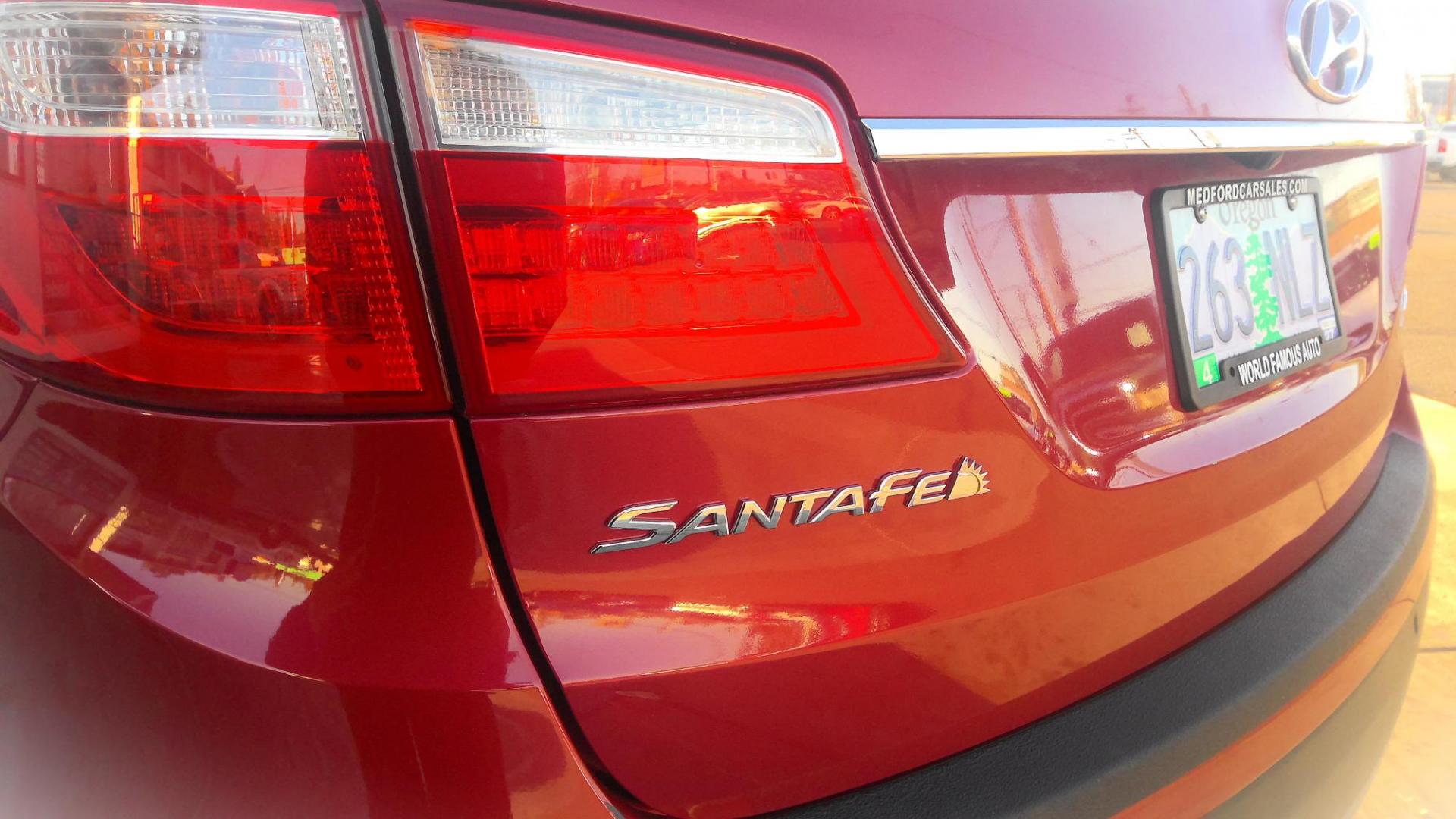 2014 RED Hyundai Santa Fe Limited AWD (KM8SRDHFXEU) with an 3.3L V6 DOHC 24V engine, 6-Speed Automatic transmission, located at 502 S. Riverside Avenue, Medford, OR, 97501, (541) 773-3136, 42.322803, -122.867477 - Photo#4