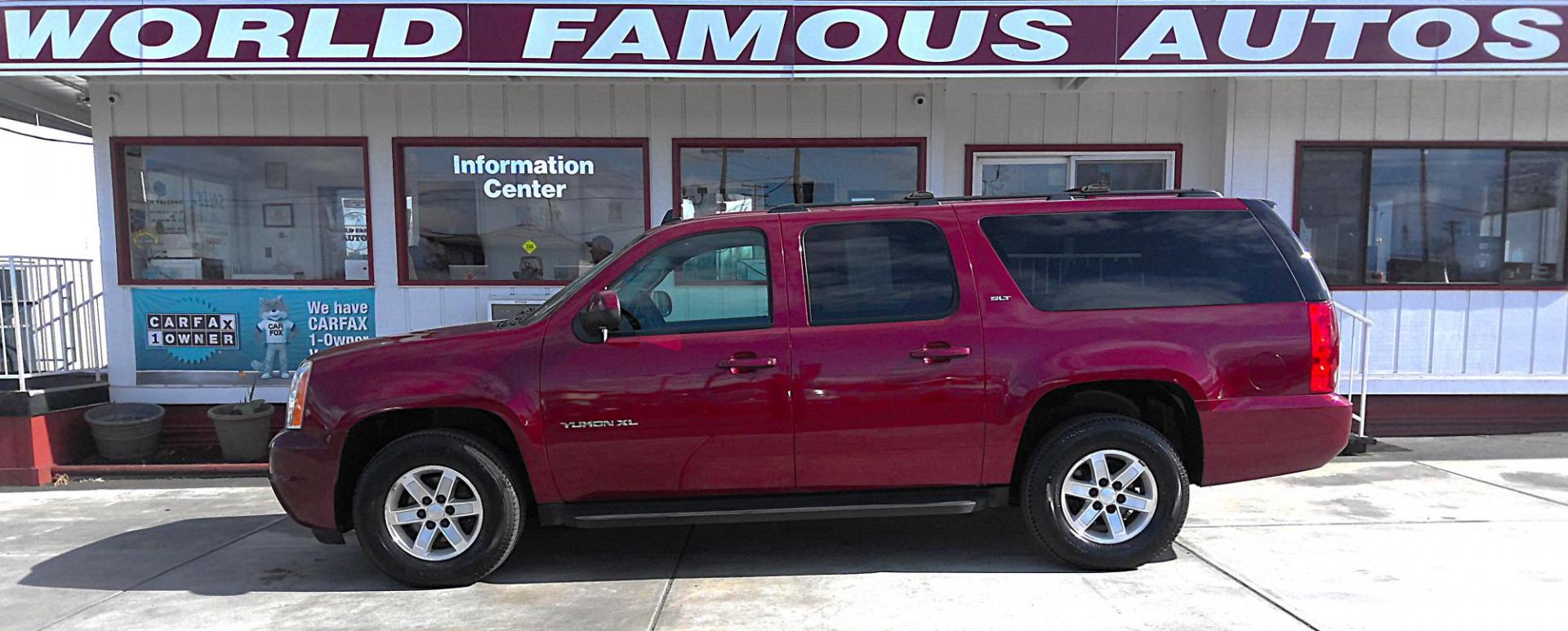 2010 RED GMC Yukon XL SLT-1 1/2 Ton 4WD (1GKUKKE32AR) with an 5.3L V8 OHV 16V FFV engine, 4-Speed Automatic transmission, located at 502 S. Riverside Avenue, Medford, OR, 97501, (541) 773-3136, 42.322803, -122.867477 - Photo#0