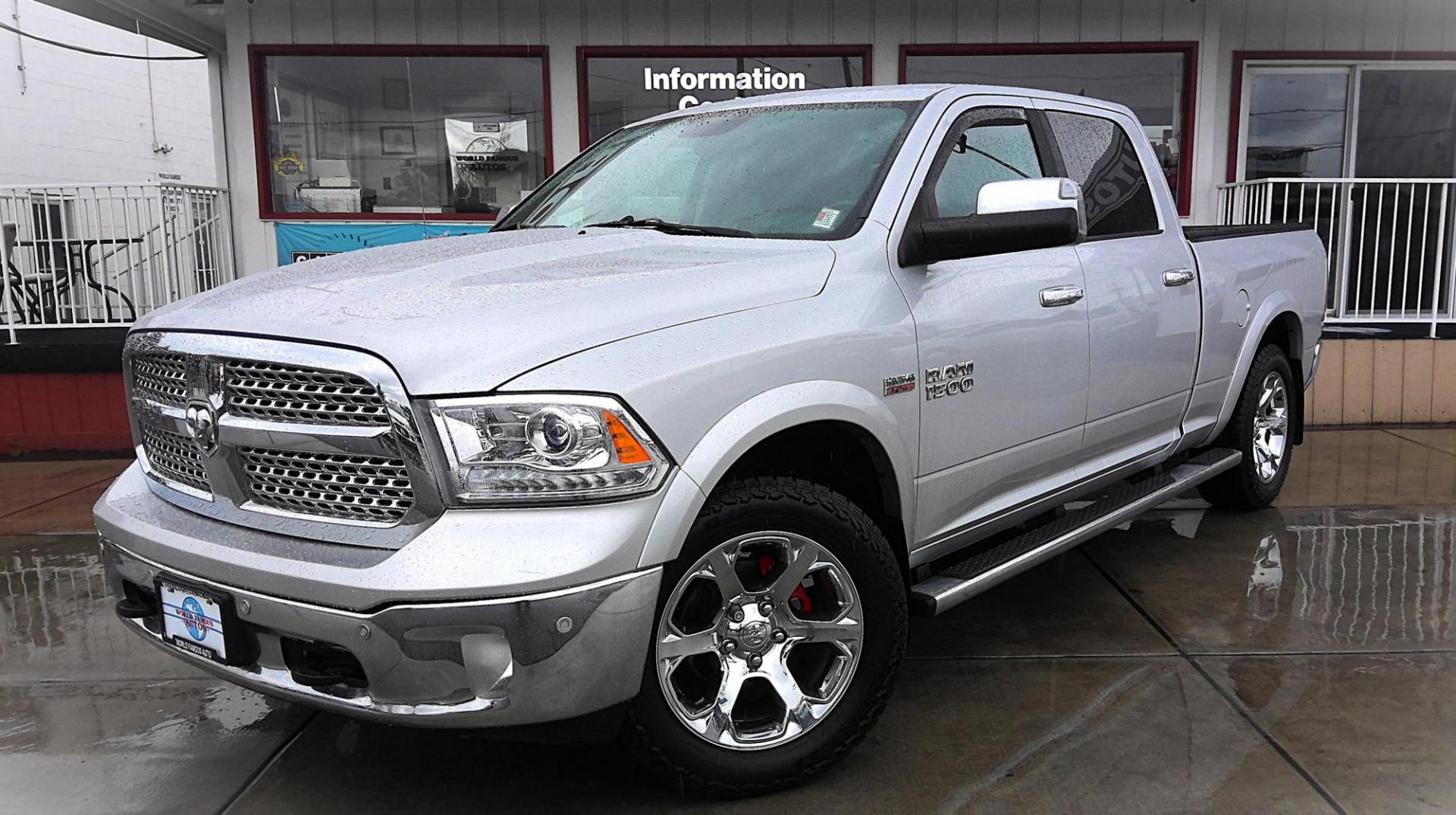 2014 SILVER RAM 1500 Laramie Crew Cab LWB 4WD (1C6RR7VTXES) with an 5.7L V8 OHV 16V engine, 6-Speed Automatic transmission, located at 502 S. Riverside Avenue, Medford, OR, 97501, (541) 773-3136, 42.322803, -122.867477 - Photo#1