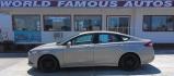 2015 GOLD Ford Fusion SE (3FA6P0H74FR) with an 2.5L L4 DOHC 16V engine, located at 502 S. Riverside Avenue, Medford, OR, 97501, (541) 773-3136, 42.322803, -122.867477 - Photo#0
