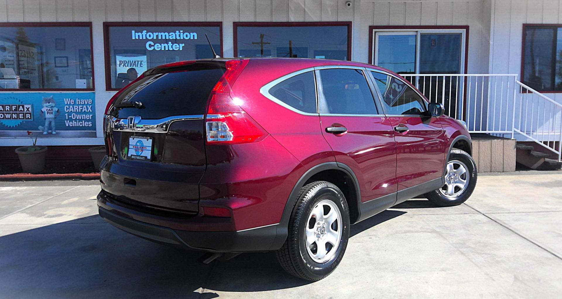 2015 RED Honda CR-V LX 2WD (2HKRM3H30FH) with an 2.4L L4 DOHC 16V engine, Continuously Variable Transmission transmission, located at 502 S. Riverside Avenue, Medford, OR, 97501, (541) 773-3136, 42.322803, -122.867477 - Photo#2