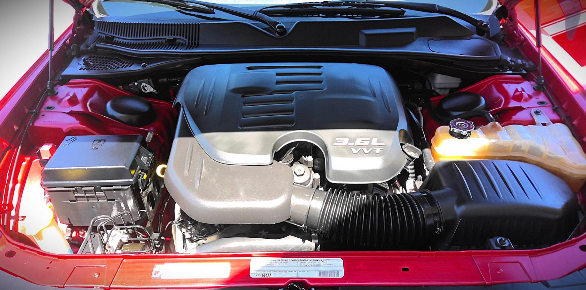 2012 RED Dodge Challenger SXT (2C3CDYAG3CH) with an 3.6L V6 DOHC 24V engine, 4-Speed Automatic transmission, located at 502 S. Riverside Avenue, Medford, OR, 97501, (541) 773-3136, 42.322803, -122.867477 - Photo#10
