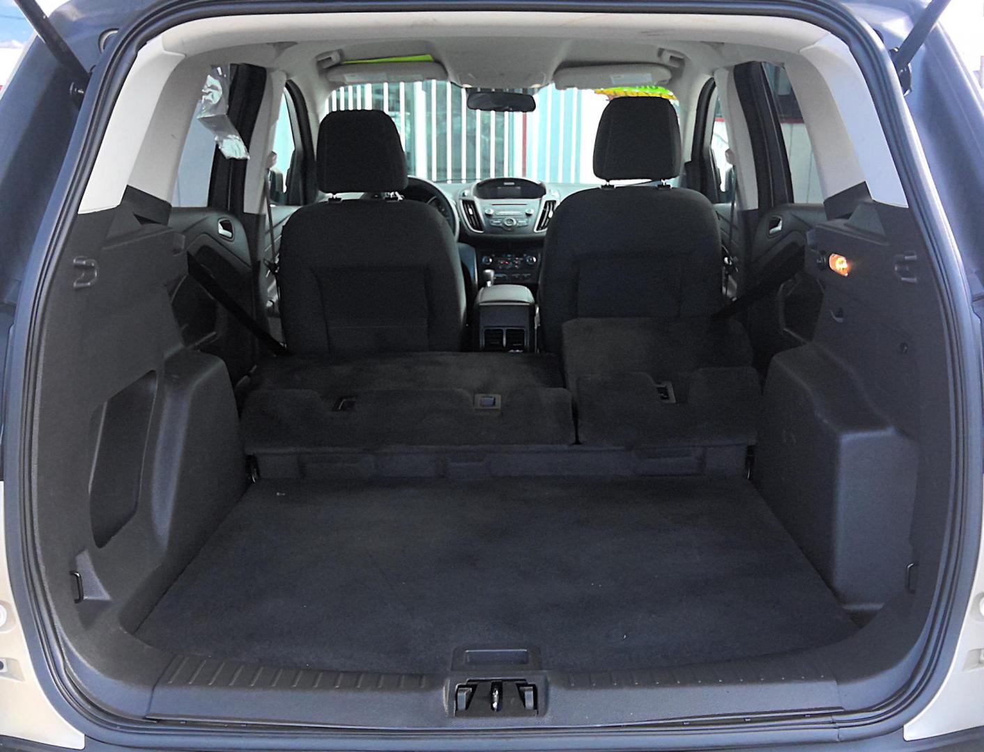 2017 GOLD Ford Escape SE 4WD (1FMCU9G99HU) with an 2.0L L4 DOHC 16V engine, 6A transmission, located at 502 S. Riverside Avenue, Medford, OR, 97501, (541) 773-3136, 42.322803, -122.867477 - Photo#4