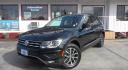 2018 BLACK Volkswagen Tiguan SE (3VV3B7AX3JM) with an 2.0L L4 DOHC 16V TURBO engine, 8A transmission, located at 502 S. Riverside Avenue, Medford, OR, 97501, (541) 773-3136, 42.322803, -122.867477 - Photo#1