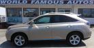 2010 GOLD Lexus RX 350 AWD (2T2BK1BAXAC) with an 3.5L V6 DOHC 24V engine, 5-Speed Automatic transmission, located at 502 S. Riverside Avenue, Medford, OR, 97501, (541) 773-3136, 42.322803, -122.867477 - Photo#0