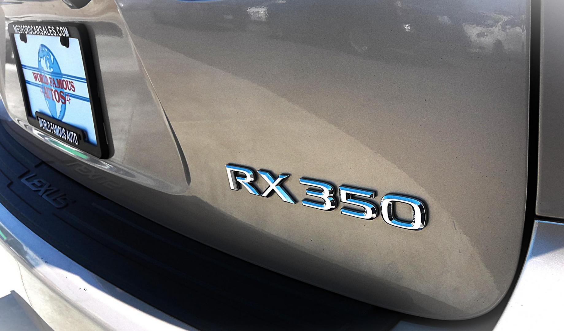 2010 GOLD Lexus RX 350 AWD (2T2BK1BAXAC) with an 3.5L V6 DOHC 24V engine, 5-Speed Automatic transmission, located at 502 S. Riverside Avenue, Medford, OR, 97501, (541) 773-3136, 42.322803, -122.867477 - Photo#3