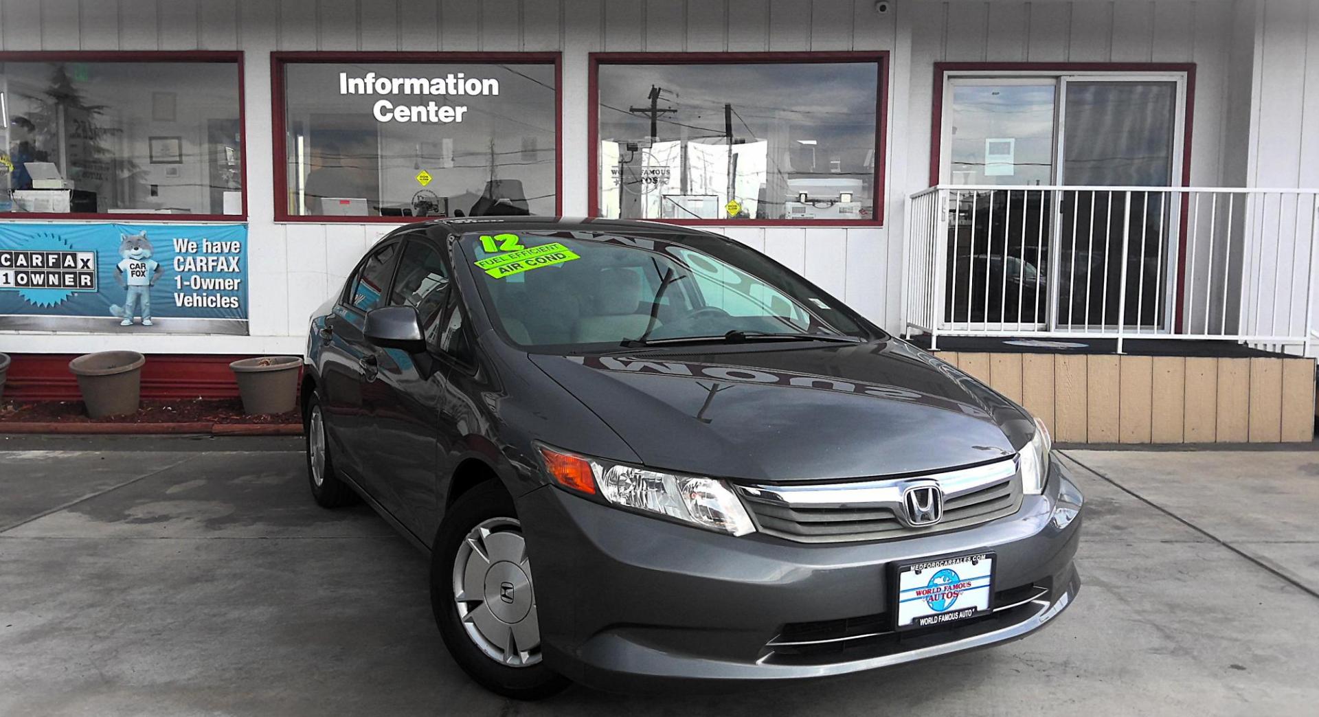 2012 GRAY Honda Civic HF Sedan 5-Speed AT (2HGFB2F6XCH) with an 1.8L L4 SOHC 16V engine, 5-Speed Automatic transmission, located at 502 S. Riverside Avenue, Medford, OR, 97501, (541) 773-3136, 42.322803, -122.867477 - Photo#1