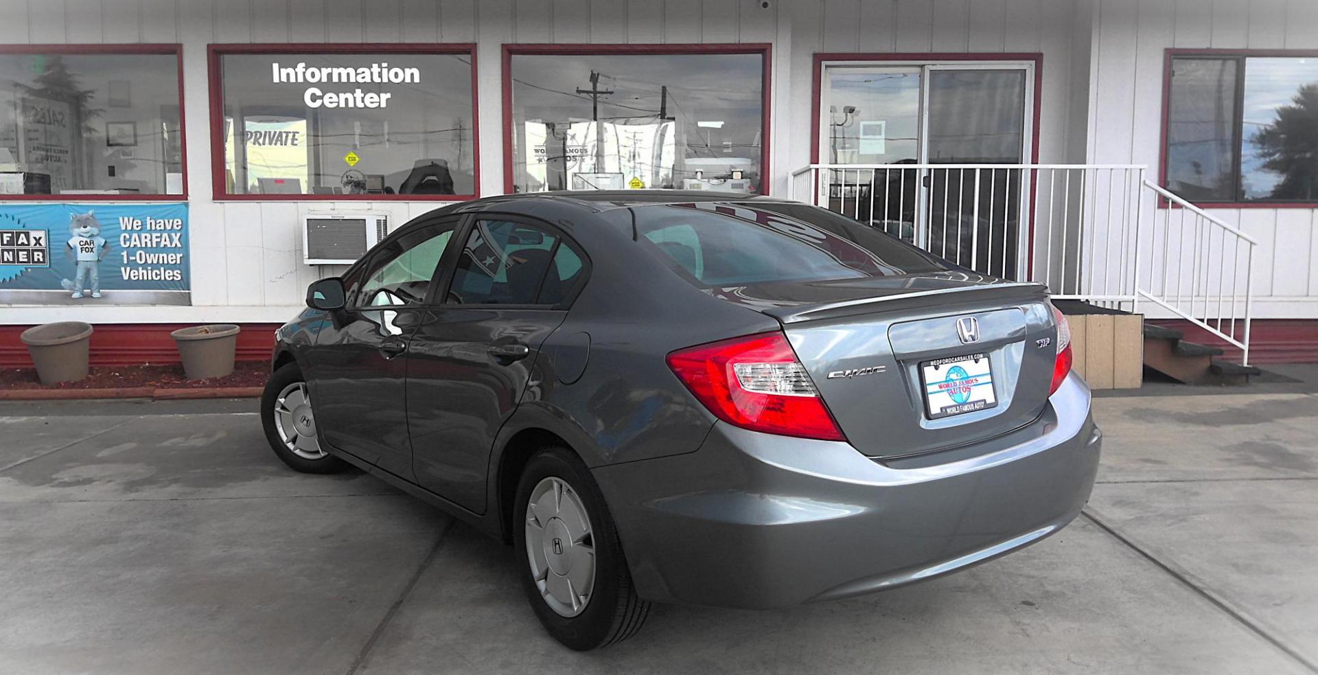 2012 GRAY Honda Civic HF Sedan 5-Speed AT (2HGFB2F6XCH) with an 1.8L L4 SOHC 16V engine, 5-Speed Automatic transmission, located at 502 S. Riverside Avenue, Medford, OR, 97501, (541) 773-3136, 42.322803, -122.867477 - Photo#2