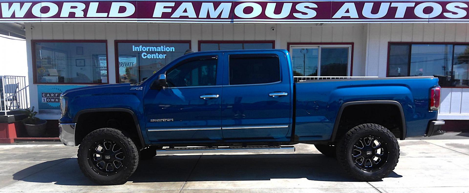 2016 BLUE GMC Sierra 1500 SLT Crew Cab Long Box 4WD (3GTU2NEJXGG) with an 6.2L V8 OHV 16V engine, 6A transmission, located at 502 S. Riverside Avenue, Medford, OR, 97501, (541) 773-3136, 42.322803, -122.867477 - Photo#0