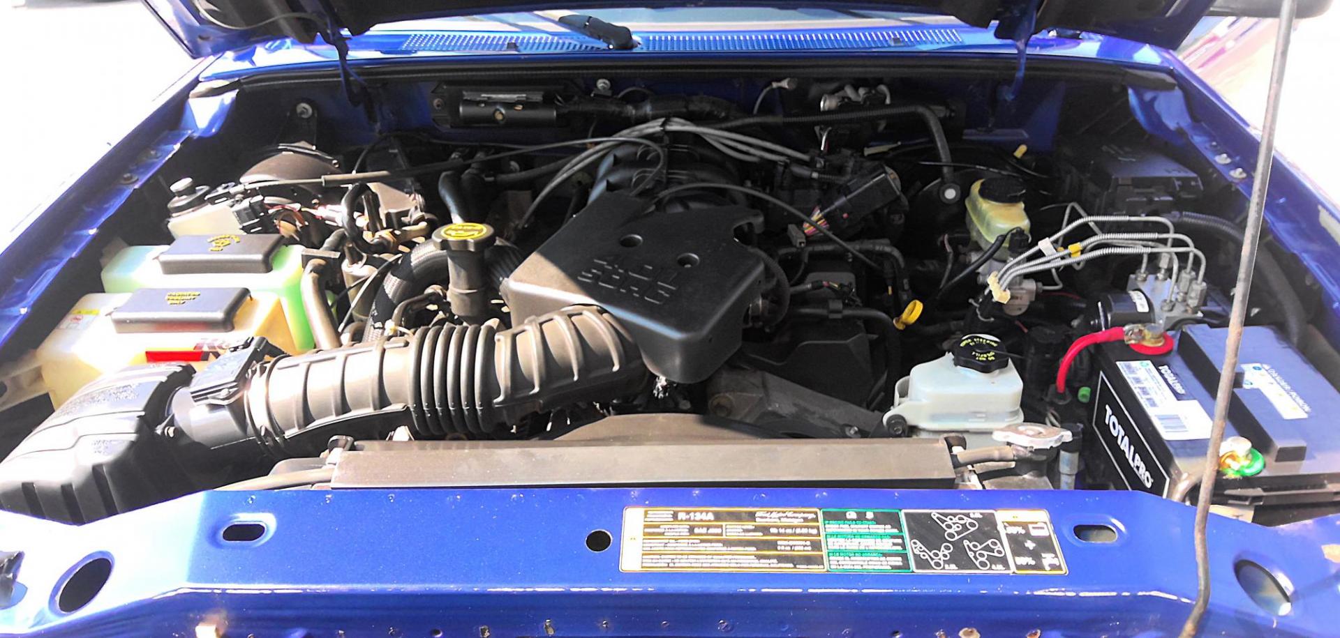 2003 BLUE Ford Ranger Edge Plus SuperCab 4WD (1FTZR45E83P) with an 4.0L V6 SOHC 12V engine, located at 502 S. Riverside Avenue, Medford, OR, 97501, (541) 773-3136, 42.322803, -122.867477 - Photo#6