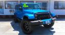 2014 BLUE Jeep Wrangler Unlimited Sahara 4WD (1C4BJWEG9EL) with an 3.6L V6 DOHC 24V FFV engine, located at 502 S. Riverside Avenue, Medford, OR, 97501, (541) 773-3136, 42.322803, -122.867477 - Photo#1