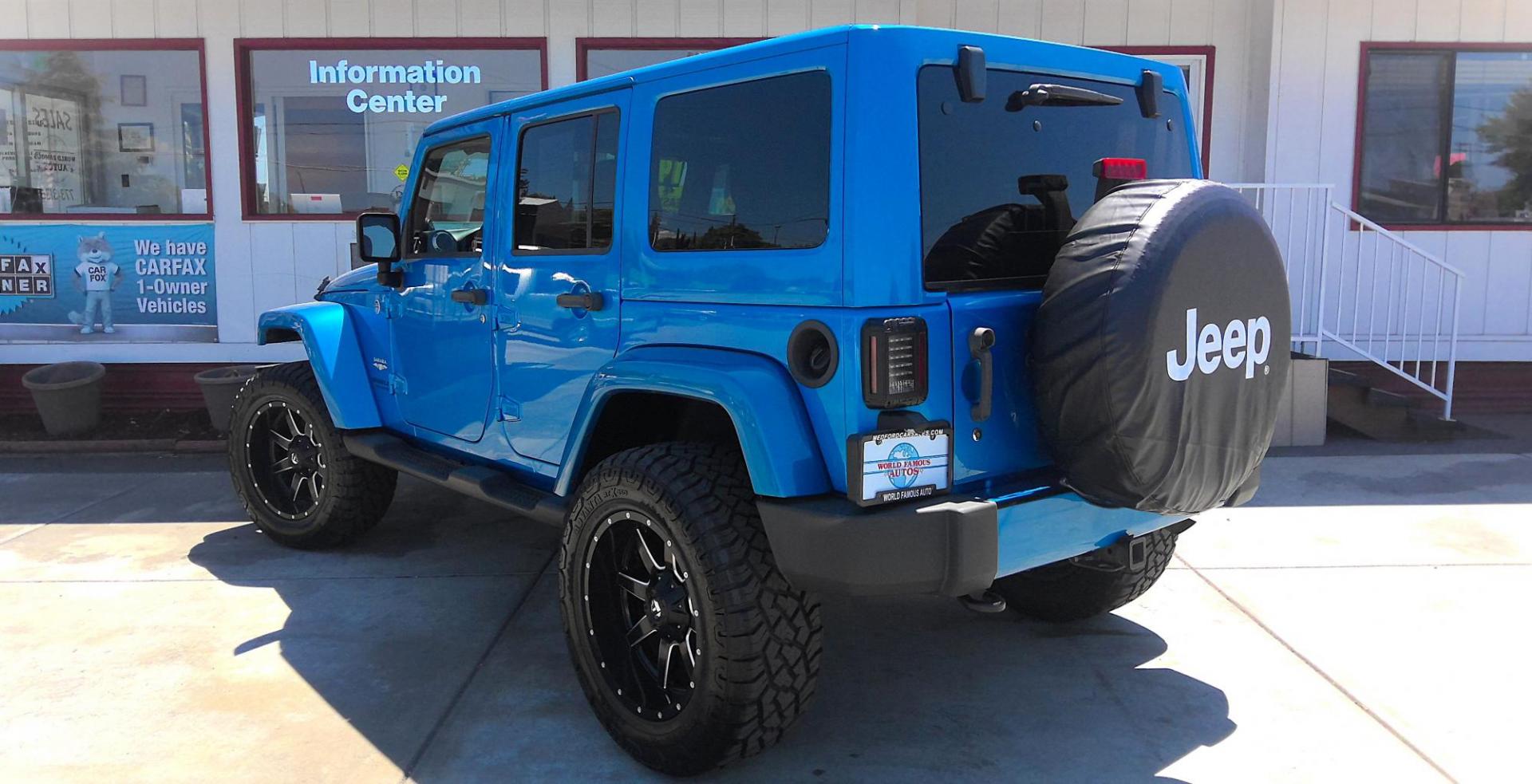 2014 BLUE Jeep Wrangler Unlimited Sahara 4WD (1C4BJWEG9EL) with an 3.6L V6 DOHC 24V FFV engine, located at 502 S. Riverside Avenue, Medford, OR, 97501, (541) 773-3136, 42.322803, -122.867477 - Photo#2