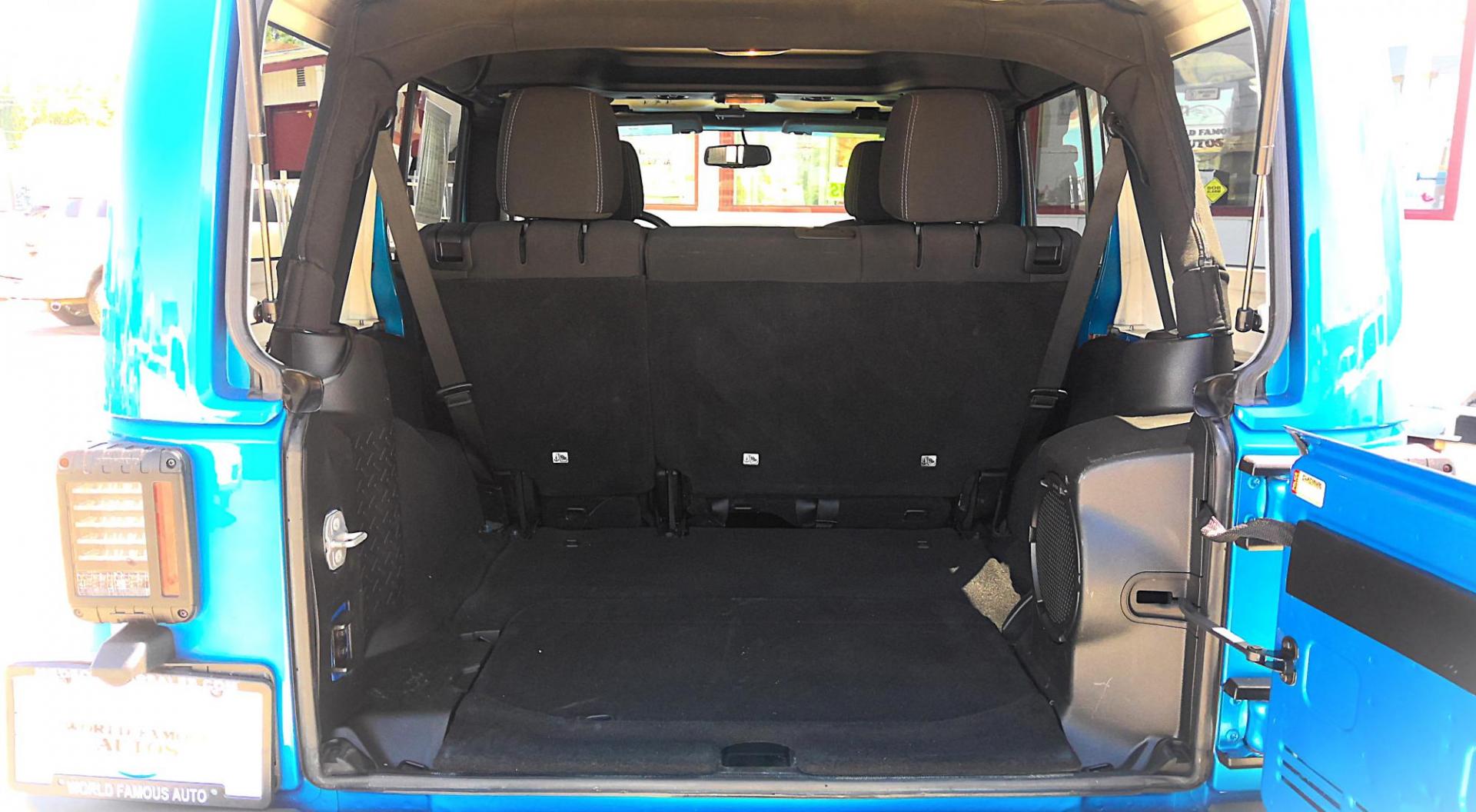 2014 BLUE Jeep Wrangler Unlimited Sahara 4WD (1C4BJWEG9EL) with an 3.6L V6 DOHC 24V FFV engine, located at 502 S. Riverside Avenue, Medford, OR, 97501, (541) 773-3136, 42.322803, -122.867477 - Photo#4