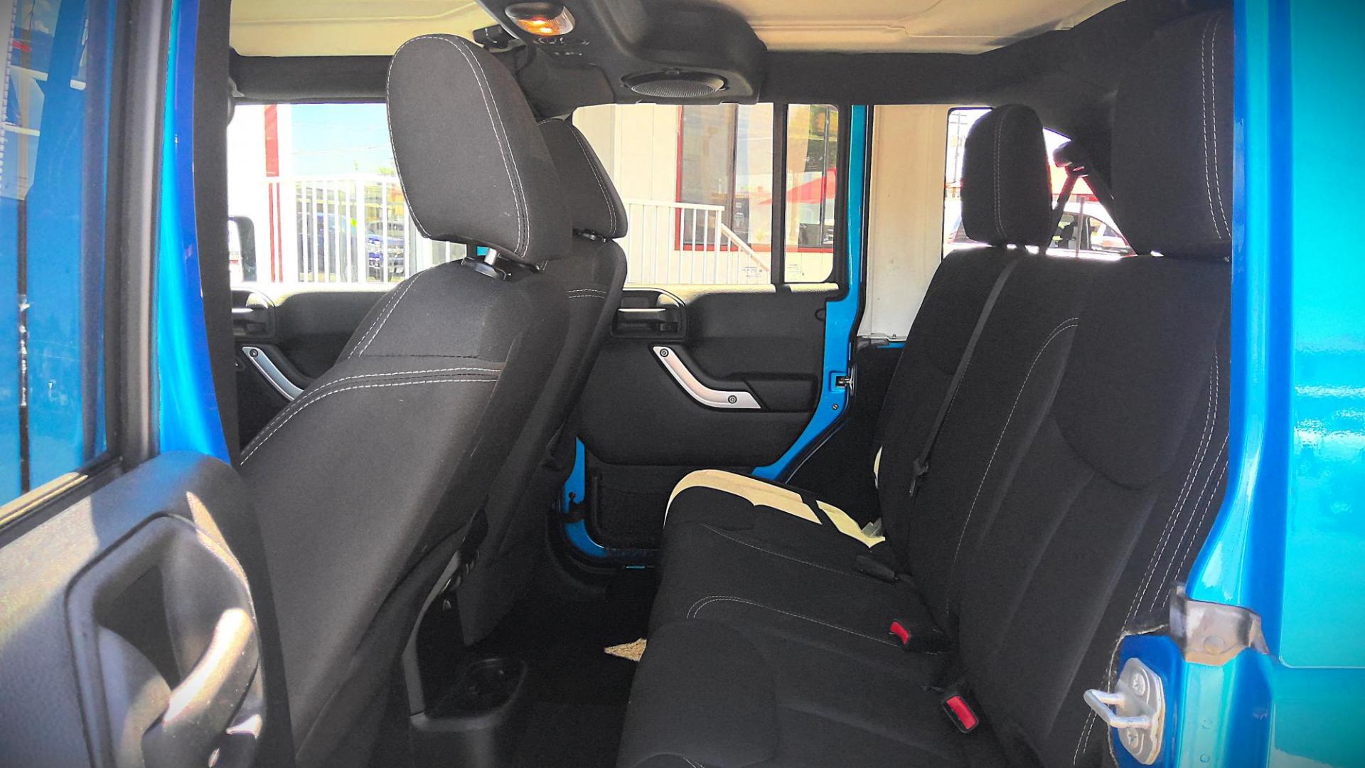 2014 BLUE Jeep Wrangler Unlimited Sahara 4WD (1C4BJWEG9EL) with an 3.6L V6 DOHC 24V FFV engine, located at 502 S. Riverside Avenue, Medford, OR, 97501, (541) 773-3136, 42.322803, -122.867477 - Photo#7