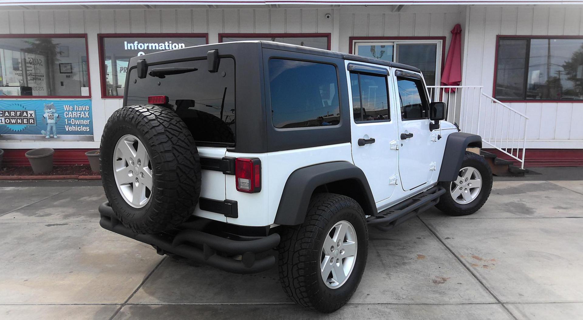 2016 WHITE Jeep Wrangler Unlimited Sport 4WD (1C4BJWDG0GL) with an 3.6L V6 DOHC 24V FFV engine, located at 502 S. Riverside Avenue, Medford, OR, 97501, (541) 773-3136, 42.322803, -122.867477 - Photo#2