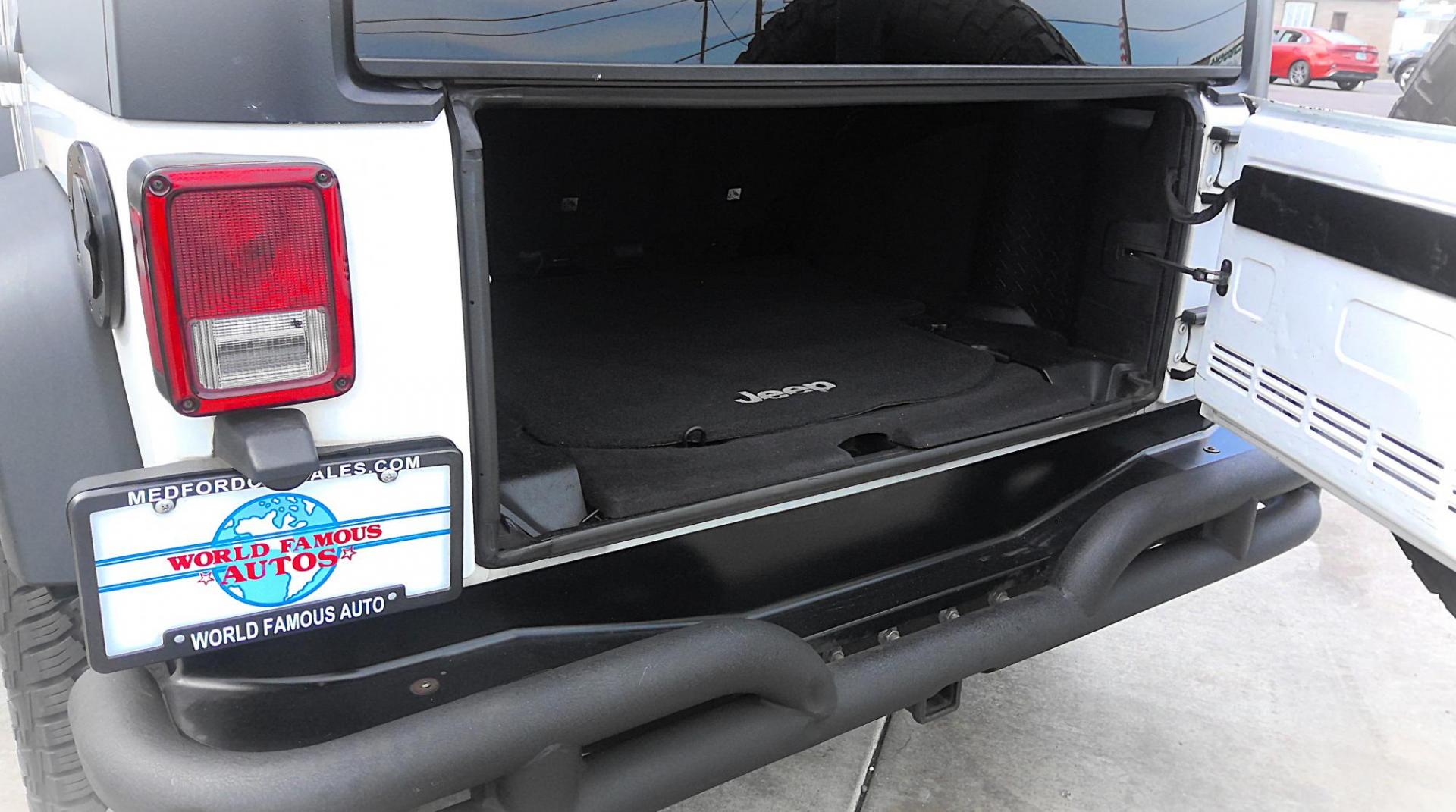 2016 WHITE Jeep Wrangler Unlimited Sport 4WD (1C4BJWDG0GL) with an 3.6L V6 DOHC 24V FFV engine, located at 502 S. Riverside Avenue, Medford, OR, 97501, (541) 773-3136, 42.322803, -122.867477 - Photo#3