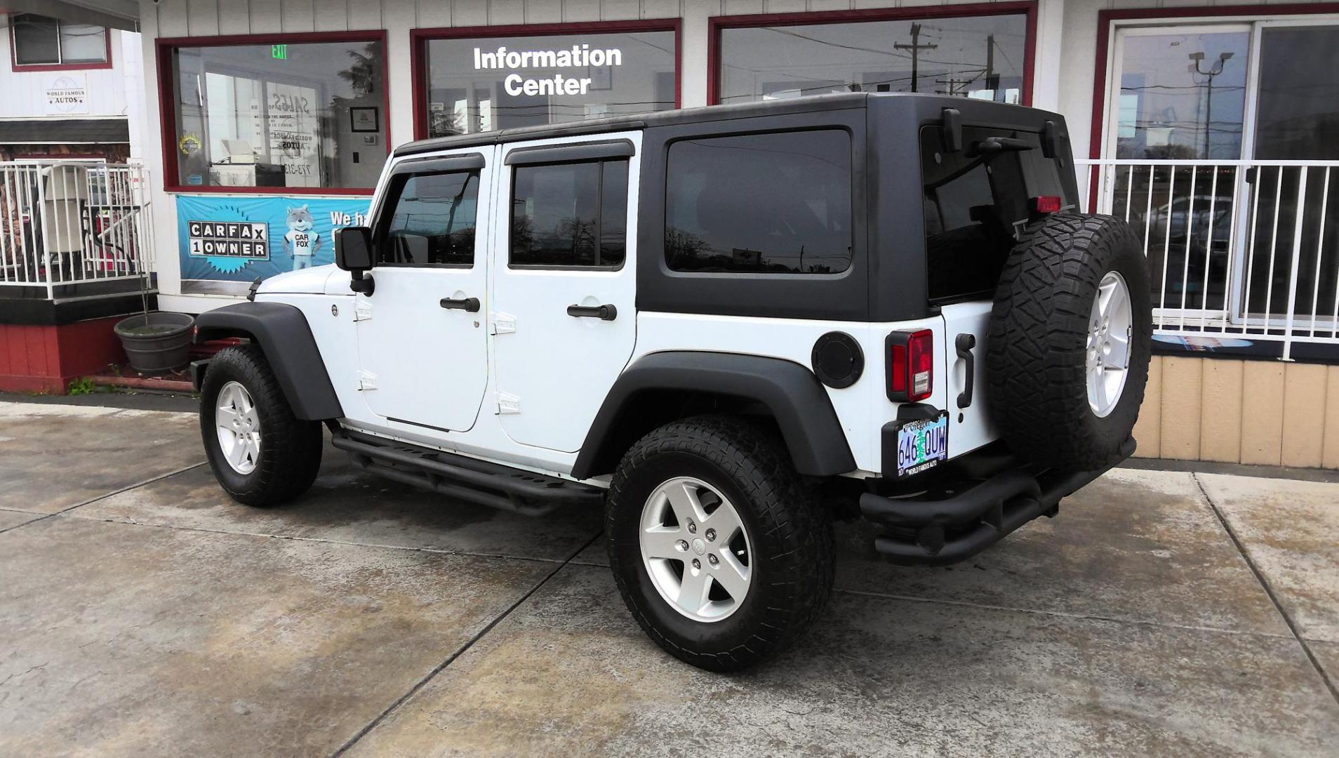 2016 WHITE Jeep Wrangler Unlimited Sport 4WD (1C4BJWDG0GL) with an 3.6L V6 DOHC 24V FFV engine, located at 502 S. Riverside Avenue, Medford, OR, 97501, (541) 773-3136, 42.322803, -122.867477 - Photo#2