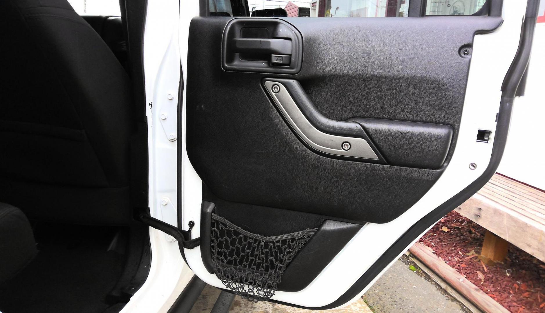 2016 WHITE Jeep Wrangler Unlimited Sport 4WD (1C4BJWDG0GL) with an 3.6L V6 DOHC 24V FFV engine, located at 502 S. Riverside Avenue, Medford, OR, 97501, (541) 773-3136, 42.322803, -122.867477 - Photo#6