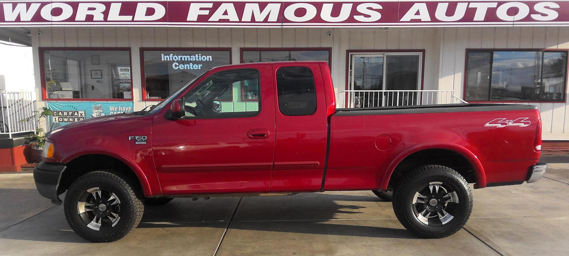 2003 RED Ford F-150 Lariat SuperCab 4WD (2FTRX18L63C) with an 5.4L V8 SOHC 16V engine, 4-Speed Automatic Overdrive transmission, located at 502 S. Riverside Avenue, Medford, OR, 97501, (541) 773-3136, 42.322803, -122.867477 - Photo#0