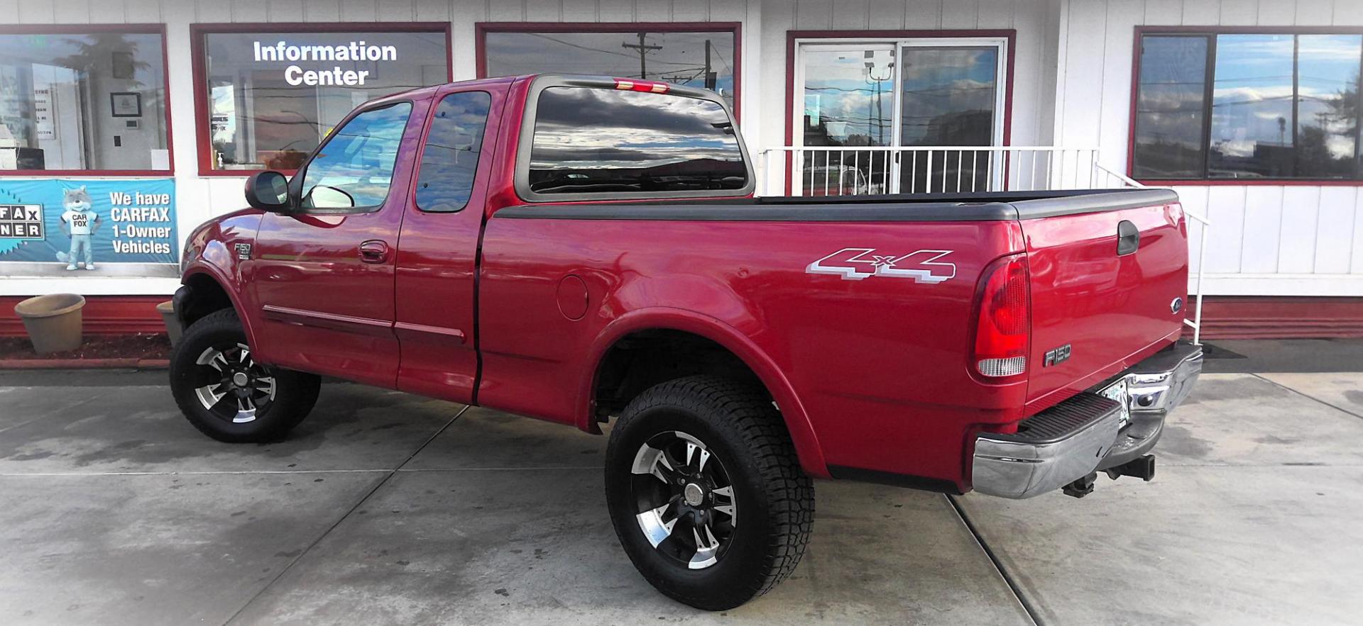 2003 RED Ford F-150 Lariat SuperCab 4WD (2FTRX18L63C) with an 5.4L V8 SOHC 16V engine, 4-Speed Automatic Overdrive transmission, located at 502 S. Riverside Avenue, Medford, OR, 97501, (541) 773-3136, 42.322803, -122.867477 - Photo#2