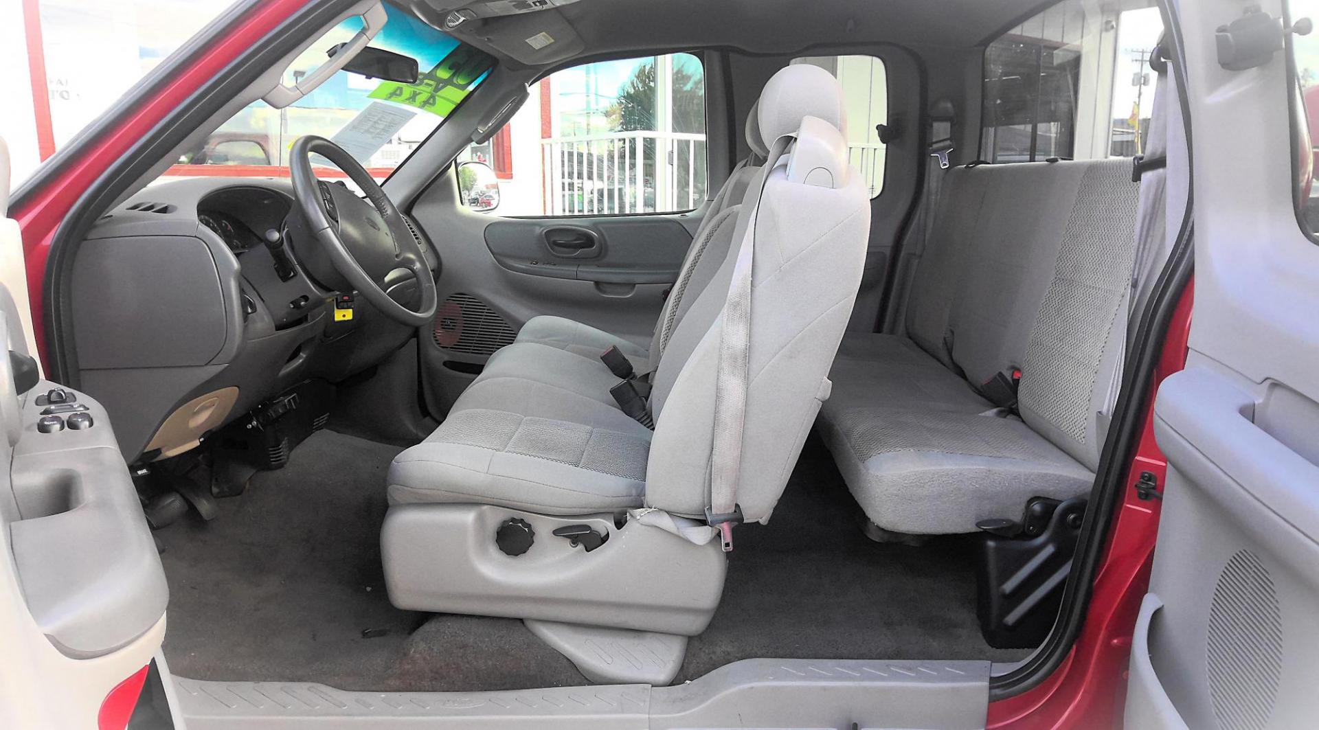 2003 RED Ford F-150 Lariat SuperCab 4WD (2FTRX18L63C) with an 5.4L V8 SOHC 16V engine, 4-Speed Automatic Overdrive transmission, located at 502 S. Riverside Avenue, Medford, OR, 97501, (541) 773-3136, 42.322803, -122.867477 - Photo#3