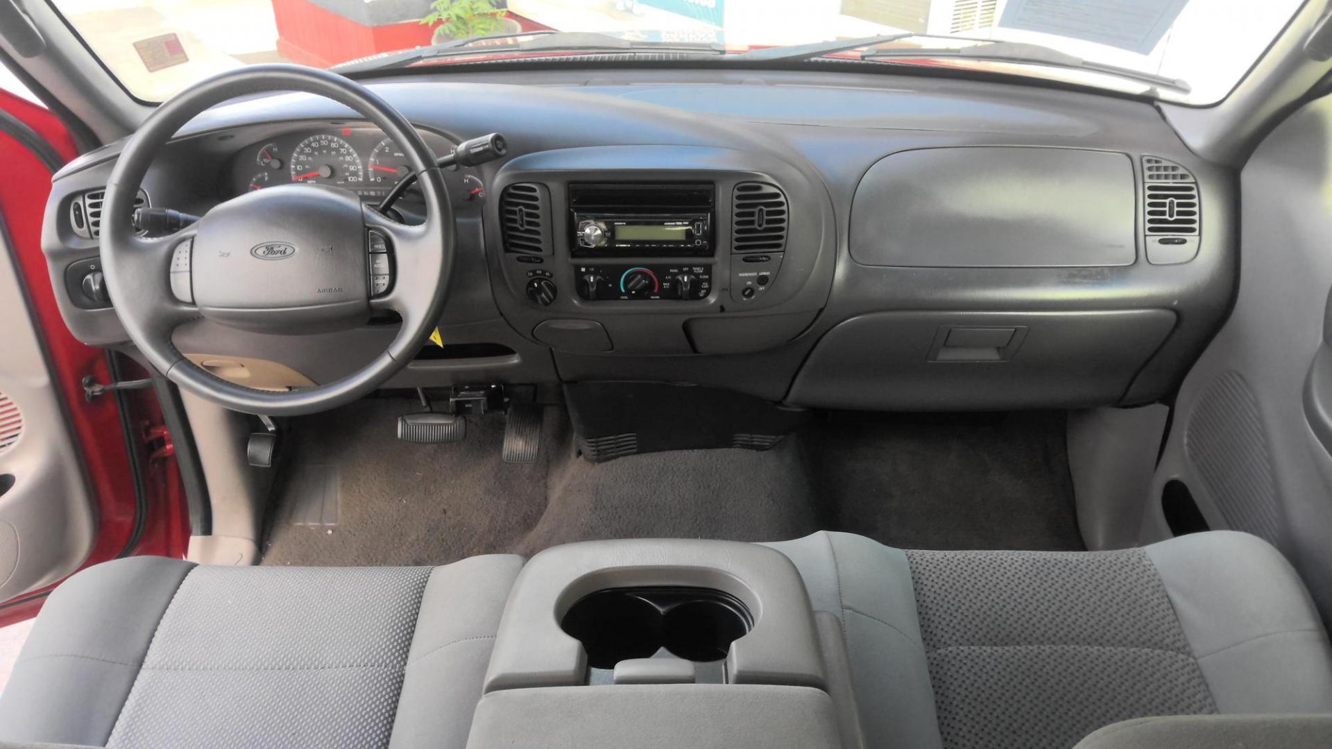 2003 RED Ford F-150 Lariat SuperCab 4WD (2FTRX18L63C) with an 5.4L V8 SOHC 16V engine, 4-Speed Automatic Overdrive transmission, located at 502 S. Riverside Avenue, Medford, OR, 97501, (541) 773-3136, 42.322803, -122.867477 - Photo#5