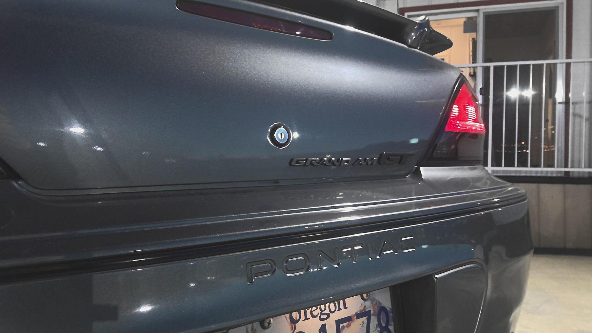 2005 GRAY Pontiac Grand AM GT coupe (1G2NW12E15M) with an 3.4L V6 OHV 12V engine, 4-Speed Automatic Overdrive transmission, located at 502 S. Riverside Avenue, Medford, OR, 97501, (541) 773-3136, 42.322803, -122.867477 - Photo#4