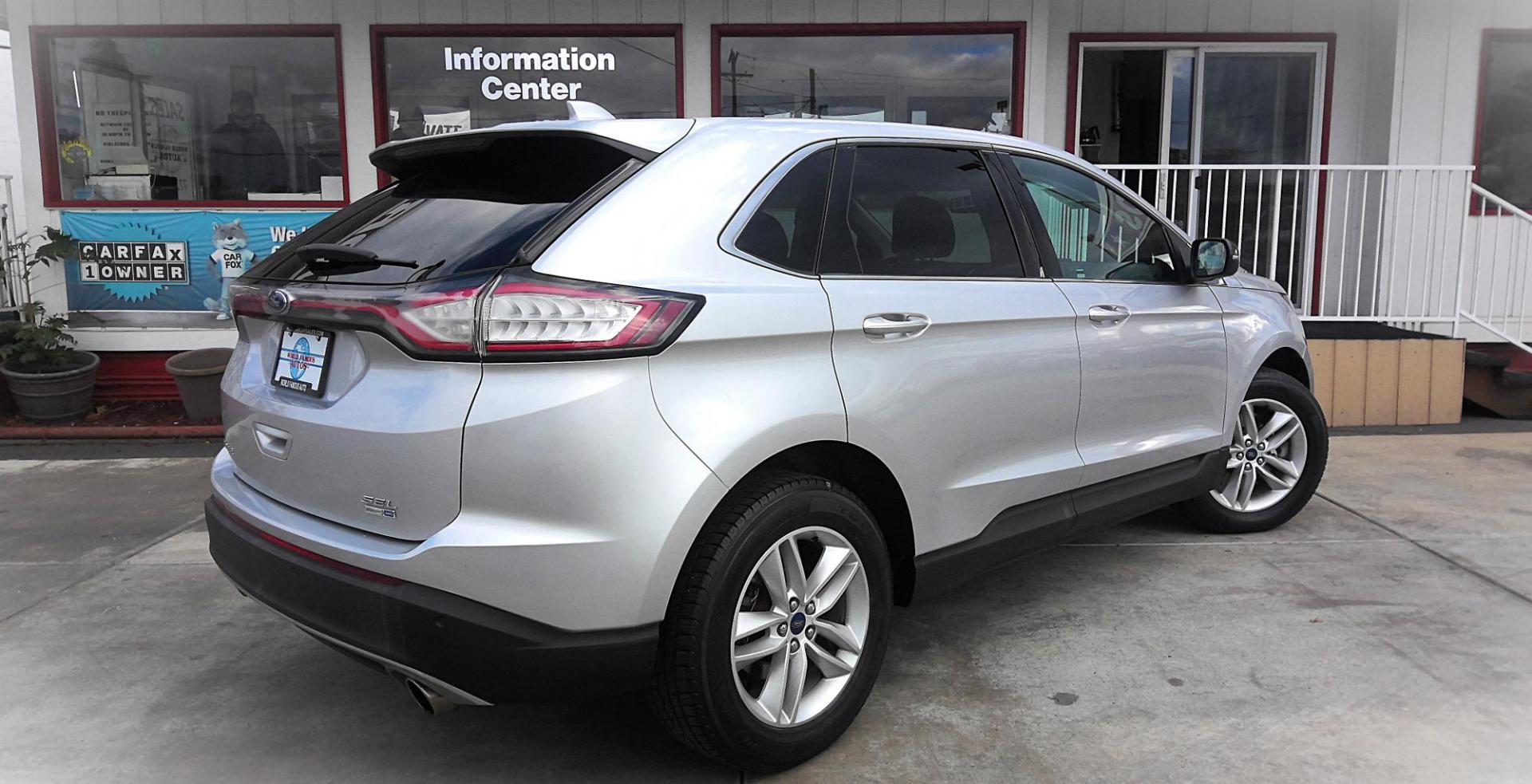 2015 SILVER Ford Edge SEL AWD (2FMTK4J9XFB) with an 2.0L L4 DOHC 16V engine, 6-Speed Automatic transmission, located at 502 S. Riverside Avenue, Medford, OR, 97501, (541) 773-3136, 42.322803, -122.867477 - Photo#2