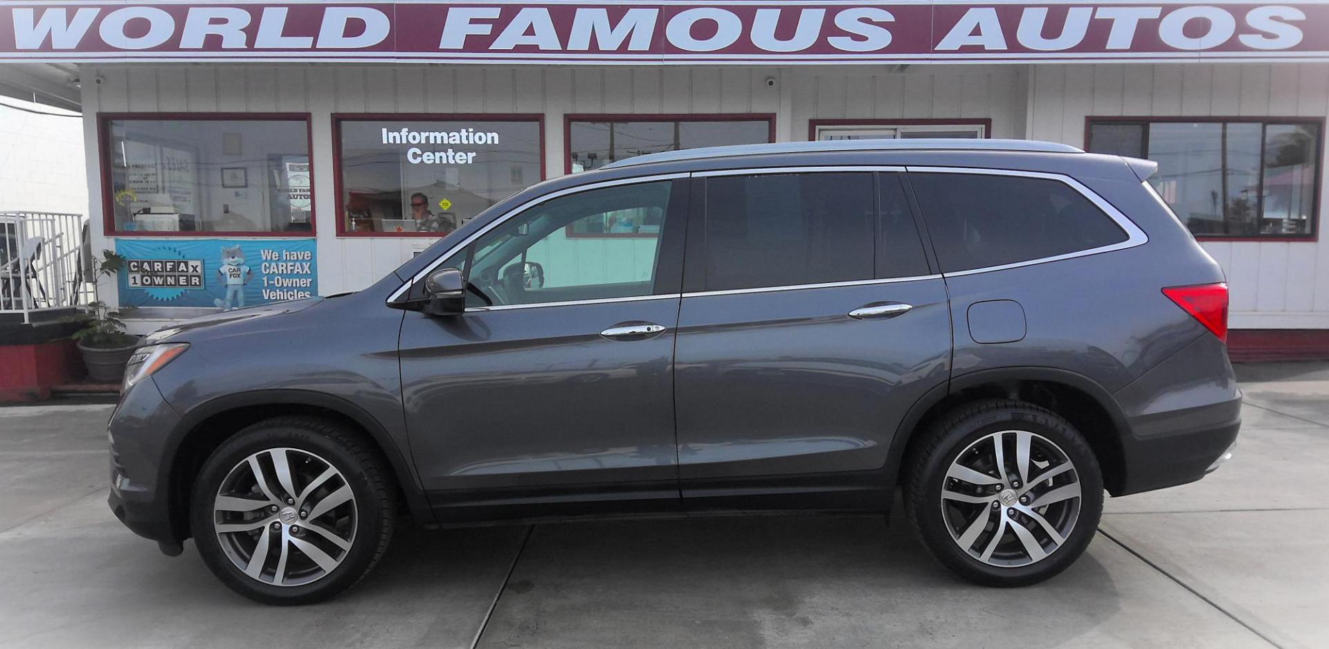 2016 GRAY Honda Pilot Touring 4WD (5FNYF6H97GB) with an 3.5L V6 SOHC 24V engine, 9-Speed Automatic transmission, located at 502 S. Riverside Avenue, Medford, OR, 97501, (541) 773-3136, 42.322803, -122.867477 - Photo#0