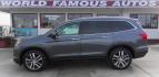 2016 GRAY Honda Pilot Touring 4WD (5FNYF6H97GB) with an 3.5L V6 SOHC 24V engine, 9-Speed Automatic transmission, located at 502 S. Riverside Avenue, Medford, OR, 97501, (541) 773-3136, 42.322803, -122.867477 - Photo#0