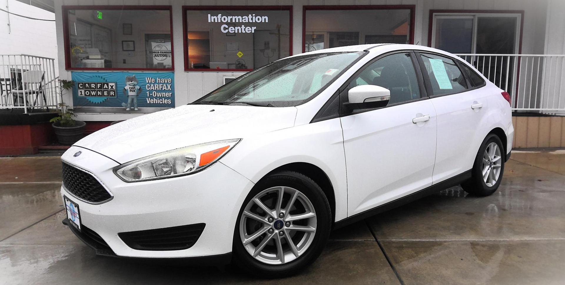 2017 WHITE Ford Focus SE Sedan (1FADP3F29HL) with an 2.0L L4 DOHC 16V engine, located at 502 S. Riverside Avenue, Medford, OR, 97501, (541) 773-3136, 42.322803, -122.867477 - Photo#1