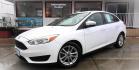 2017 WHITE Ford Focus SE Sedan (1FADP3F29HL) with an 2.0L L4 DOHC 16V engine, located at 502 S. Riverside Avenue, Medford, OR, 97501, (541) 773-3136, 42.322803, -122.867477 - Photo#1