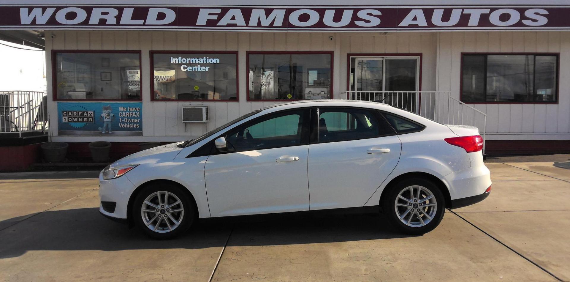 2017 WHITE Ford Focus SE Sedan (1FADP3F29HL) with an 2.0L L4 DOHC 16V engine, located at 502 S. Riverside Avenue, Medford, OR, 97501, (541) 773-3136, 42.322803, -122.867477 - Photo#0