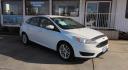 2017 WHITE Ford Focus SE Sedan (1FADP3F29HL) with an 2.0L L4 DOHC 16V engine, located at 502 S. Riverside Avenue, Medford, OR, 97501, (541) 773-3136, 42.322803, -122.867477 - Photo#1