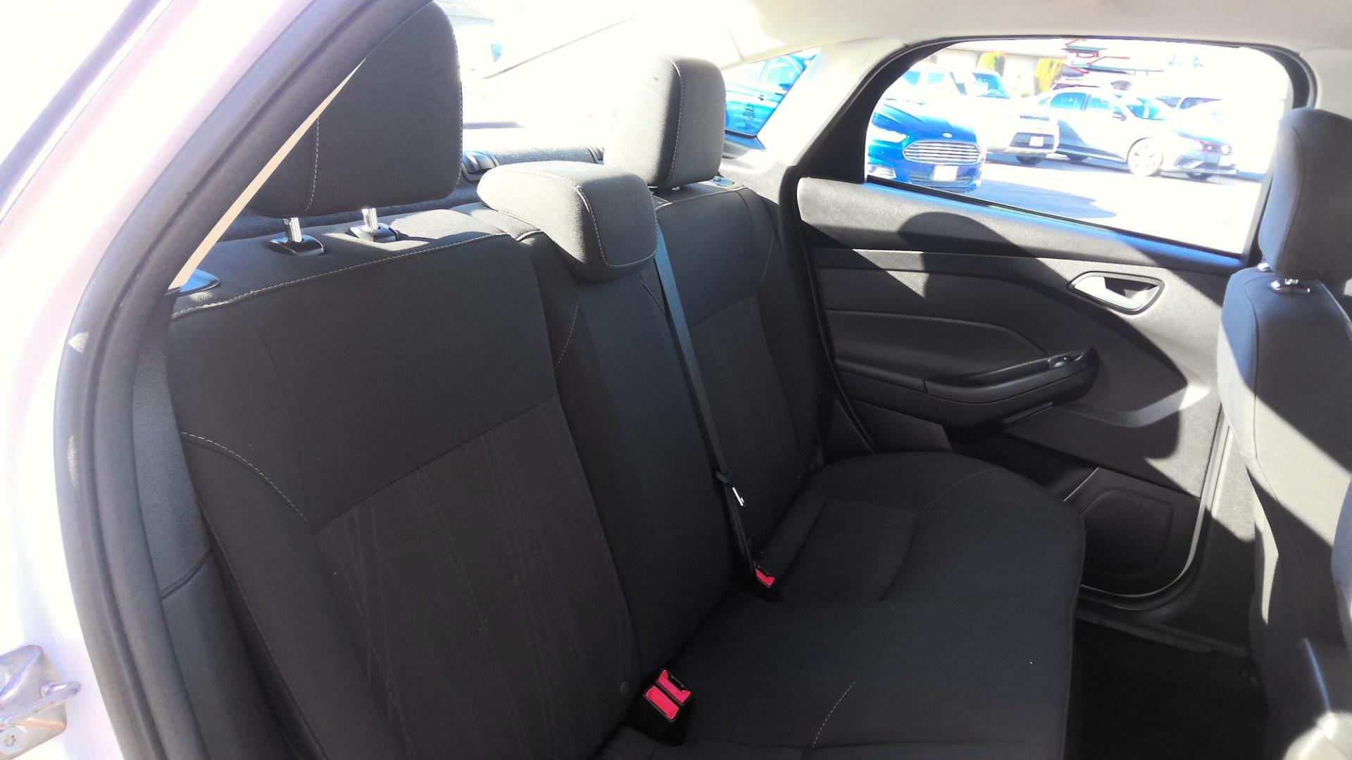 2017 WHITE Ford Focus SE Sedan (1FADP3F29HL) with an 2.0L L4 DOHC 16V engine, located at 502 S. Riverside Avenue, Medford, OR, 97501, (541) 773-3136, 42.322803, -122.867477 - Photo#6