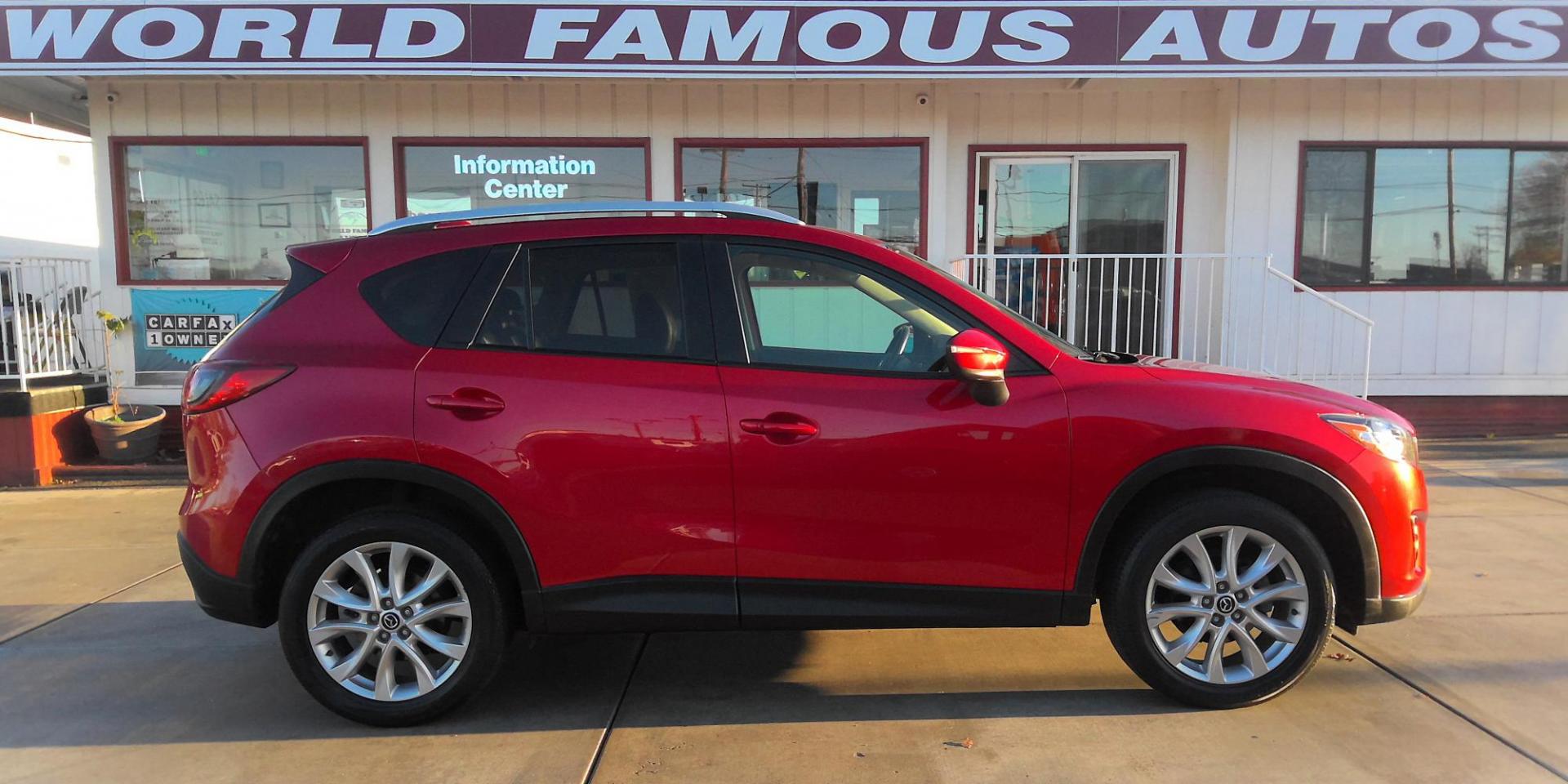 2015 RED Mazda CX-5 Grand Touring AWD (JM3KE4DY5F0) with an 2.5L L4 DOHC 16V engine, 6-Speed Automatic transmission, located at 502 S. Riverside Avenue, Medford, OR, 97501, (541) 773-3136, 42.322803, -122.867477 - Photo#0
