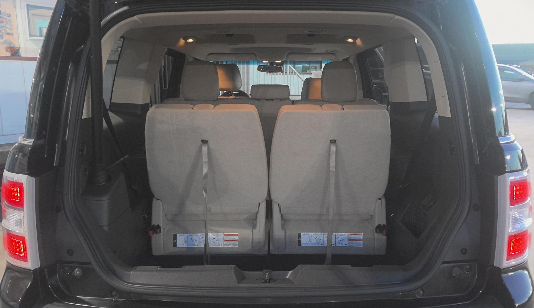 2014 BLACK Ford Flex Limited AWD w/EcoBoost (2FMHK6DT2EB) with an 3.5L V6 DOHC 24V engine, 6-Speed Automatic Overdrive transmission, located at 502 S. Riverside Avenue, Medford, OR, 97501, (541) 773-3136, 42.322803, -122.867477 - Photo#5