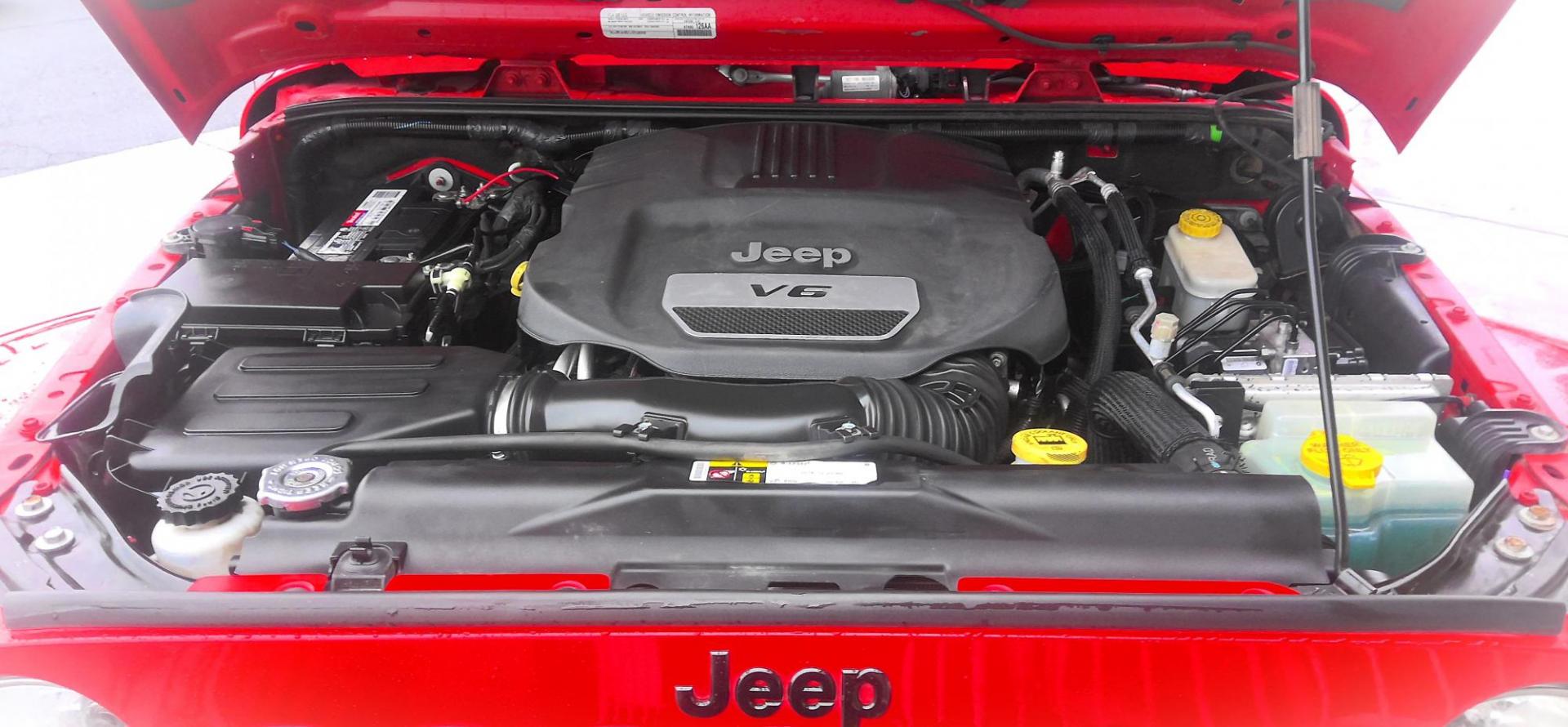 2015 RED Jeep Wrangler Unlimited Sahara 4WD (1C4HJWEG1FL) with an 3.6L V6 DOHC 24V FFV engine, located at 502 S. Riverside Avenue, Medford, OR, 97501, (541) 773-3136, 42.322803, -122.867477 - Photo#9