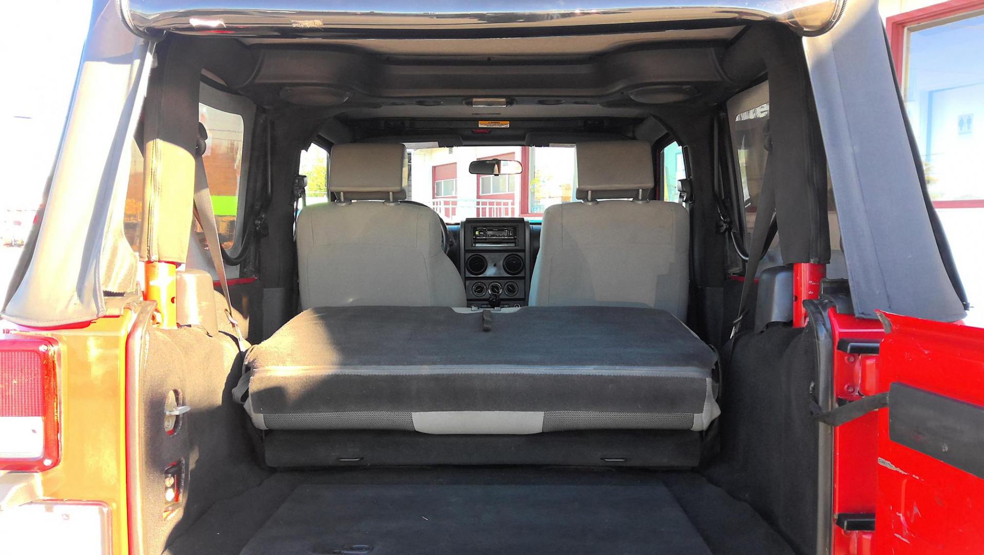 2010 RED Jeep Wrangler Sport 4WD (1J4AA2D14AL) with an 3.8L V6 OHV 12V engine, located at 502 S. Riverside Avenue, Medford, OR, 97501, (541) 773-3136, 42.322803, -122.867477 - Photo#4