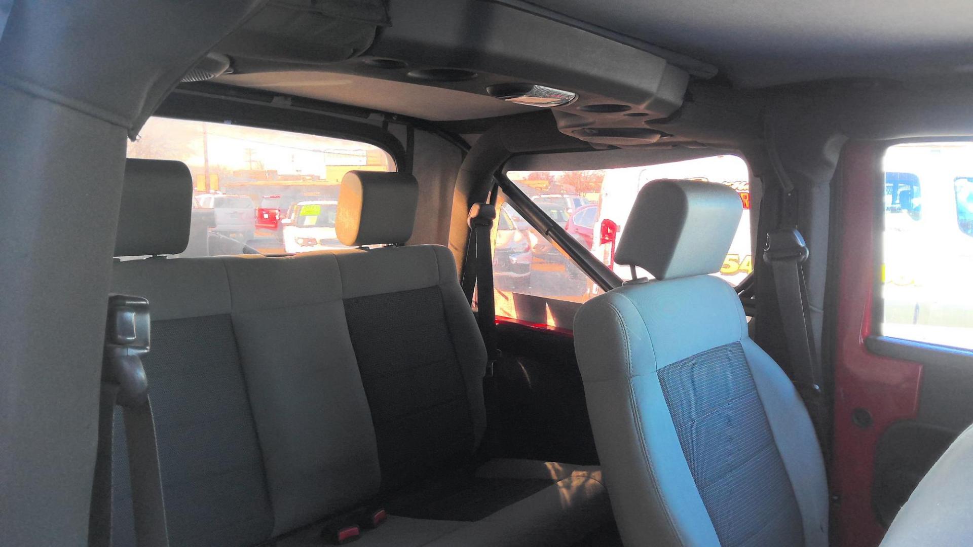 2010 RED Jeep Wrangler Sport 4WD (1J4AA2D14AL) with an 3.8L V6 OHV 12V engine, located at 502 S. Riverside Avenue, Medford, OR, 97501, (541) 773-3136, 42.322803, -122.867477 - Photo#5