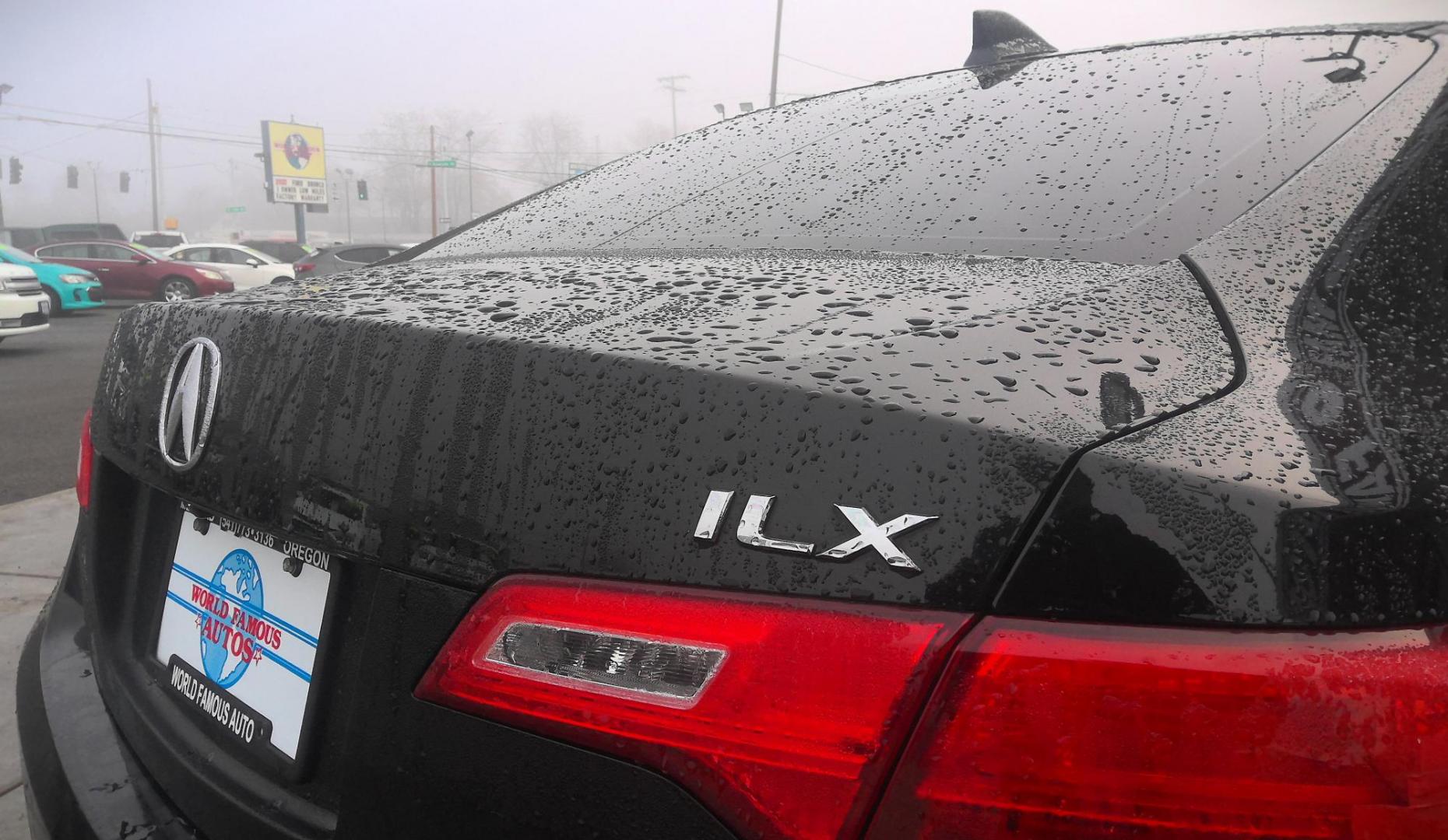 2013 BLACK Acura ILX 5-Spd AT w/ Premium Package (19VDE1F52DE) with an 2.0L L4 16V DOHC engine, 5-Speed Automatic transmission, located at 502 S. Riverside Avenue, Medford, OR, 97501, (541) 773-3136, 42.322803, -122.867477 - Photo#3